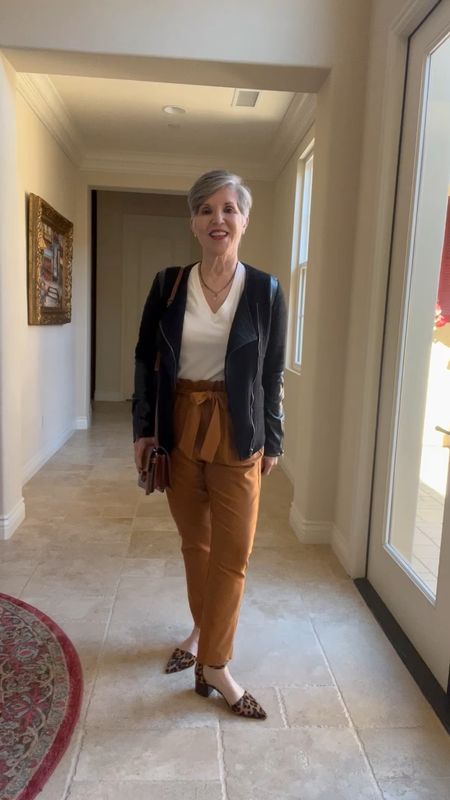 Wear black and brown together for fall! Black moto jacket/ white neck tee, brown paper bag pants/ leopard 🐆 sling back shoes/terrific brown crossbody bag

#LTKshoecrush #LTKstyletip #LTKunder50