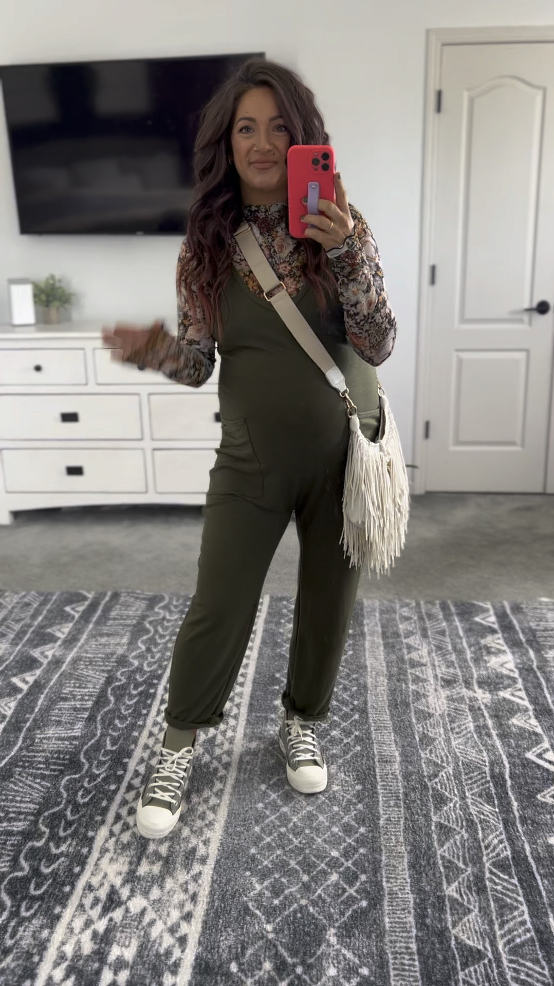 The cutest non maternity fall outfit. This jumpsuit is a go-to for me and can be styled so many ways! Runs oversized/baggy in your true size 

#LTKBump #LTKStyleTip #LTKVideo