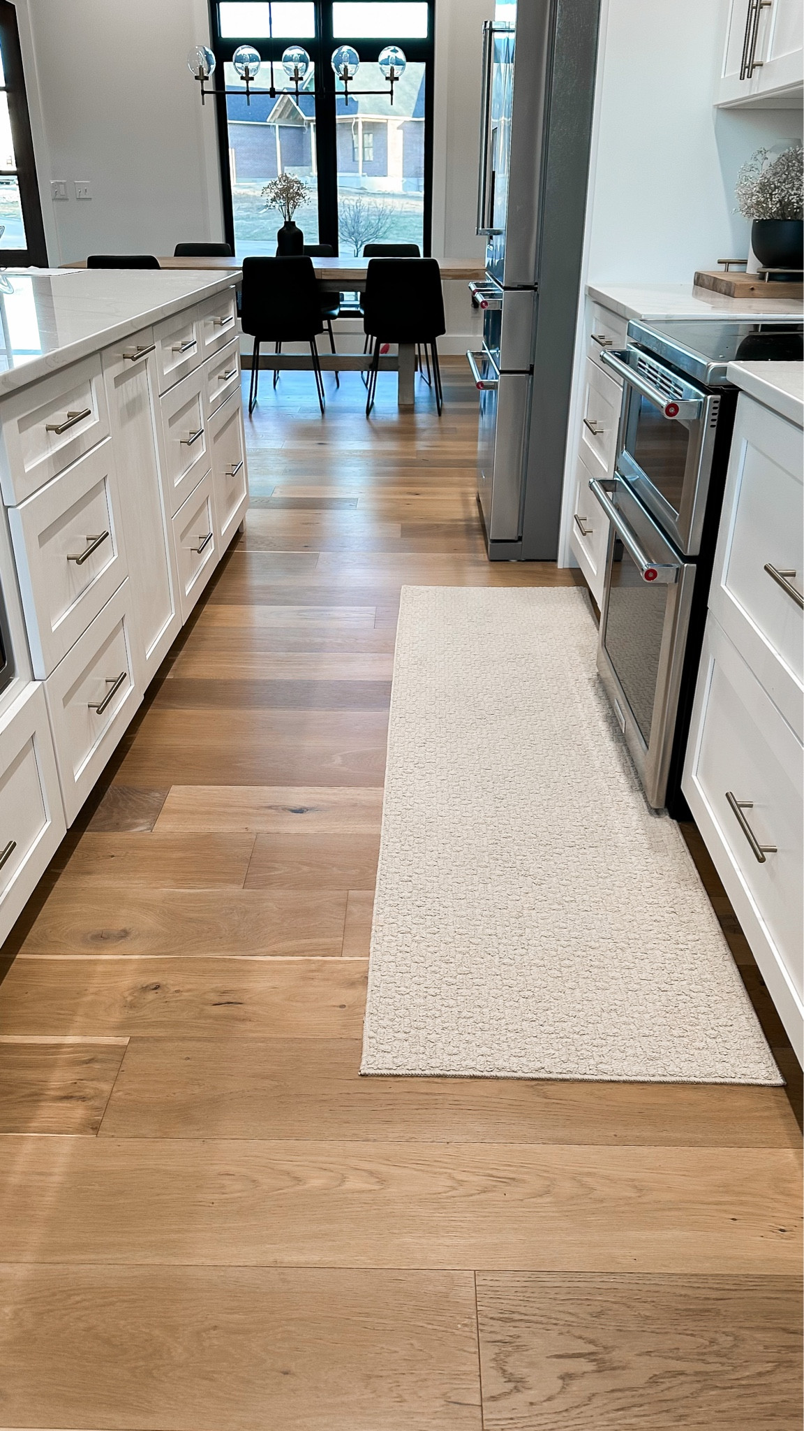 My washable rubber-backed inexpensive runners are holding up so well and have been washed multiple times now! In the kitchen, especially in front of the stove, these rugs get a lot of traffic, spills and grease pops. I was so tired of purchasing and throwing out other rugs so I grabbed these super inexpensive washable ones from Target and haven’t looked back! They still look great and work wonderfully!
.
.
kitchen, rug, runner, organic modern, white kitchen, kitchenaid refrigerator, stove, quartz, Calacatta, wood floors, white oak floors, engineered hardwood


#LTKhome #LTKunder50 #LTKstyletip