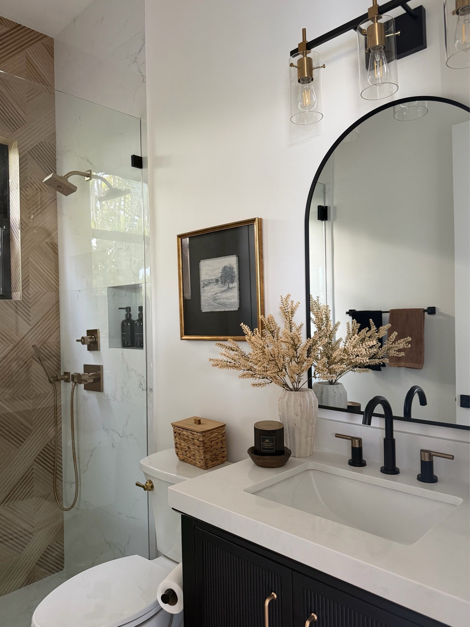 Neutral bathroom, texture, organic, moody bathroom,arch mirror,amazon,delta champagne bronze, fall,seasonal