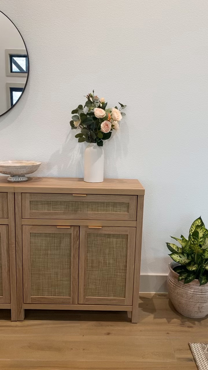 Entryway cabinet or console table. Decorated with table lamp, vase, stems, decor books, decorative bowl  

#LTKHome #LTKVideo