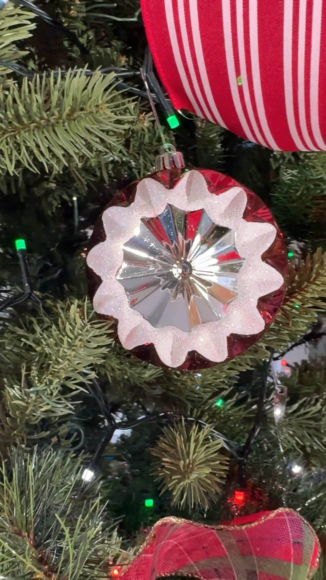 Classic, retro style Christmas tree in a historic home. Lots of red green and white retro style ornaments make this the perfect classic style Christmas tree.

#LTKHoliday #LTKHome #LTKSeasonal
