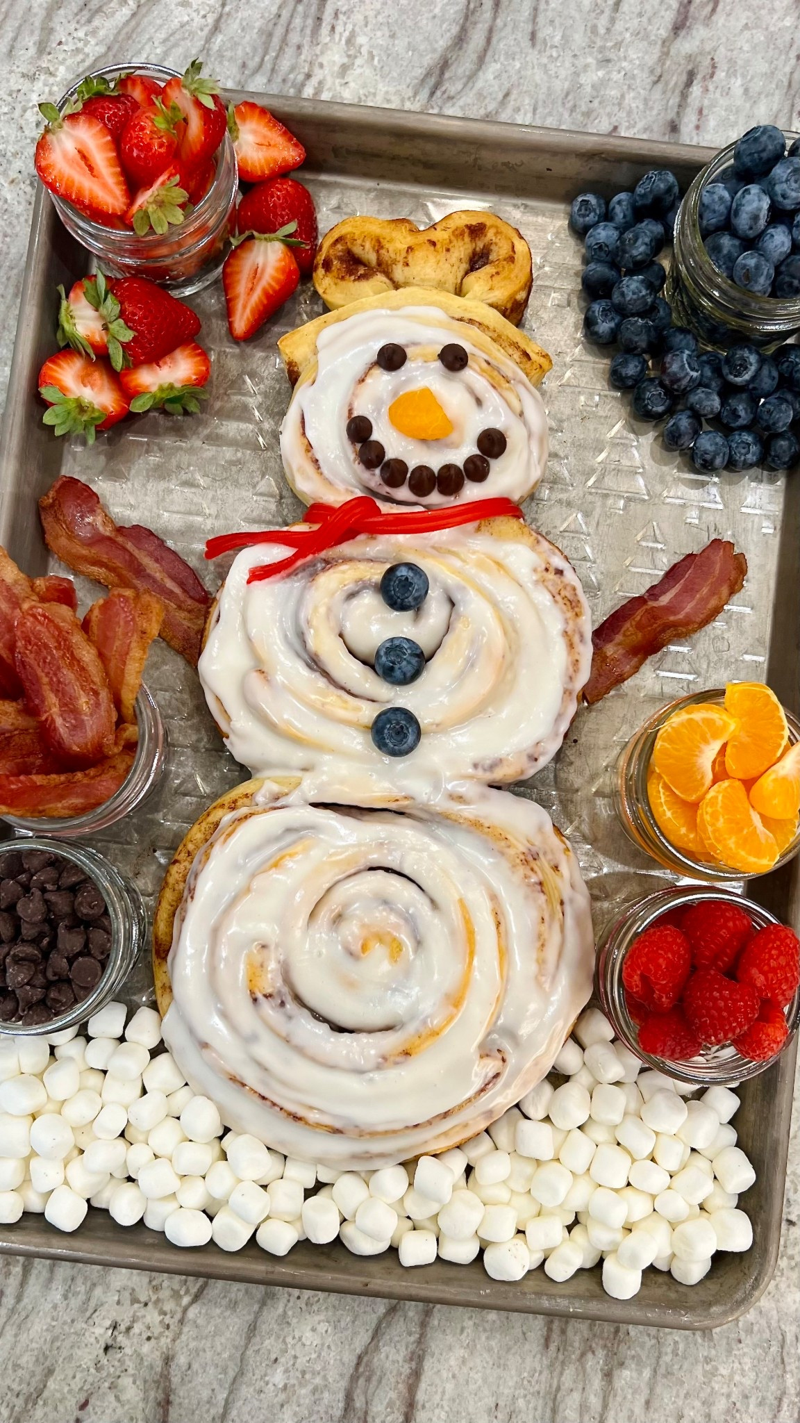 Say good morning to one cool character with this Cinnamon Roll Snowman Breakfast Tray. Fresh fruit, crispy bacon, and the cutest cinnamon roll around, it’s a sweet way to start a winter’s day!

#LTKSeasonal #LTKHoliday #LTKfoodie