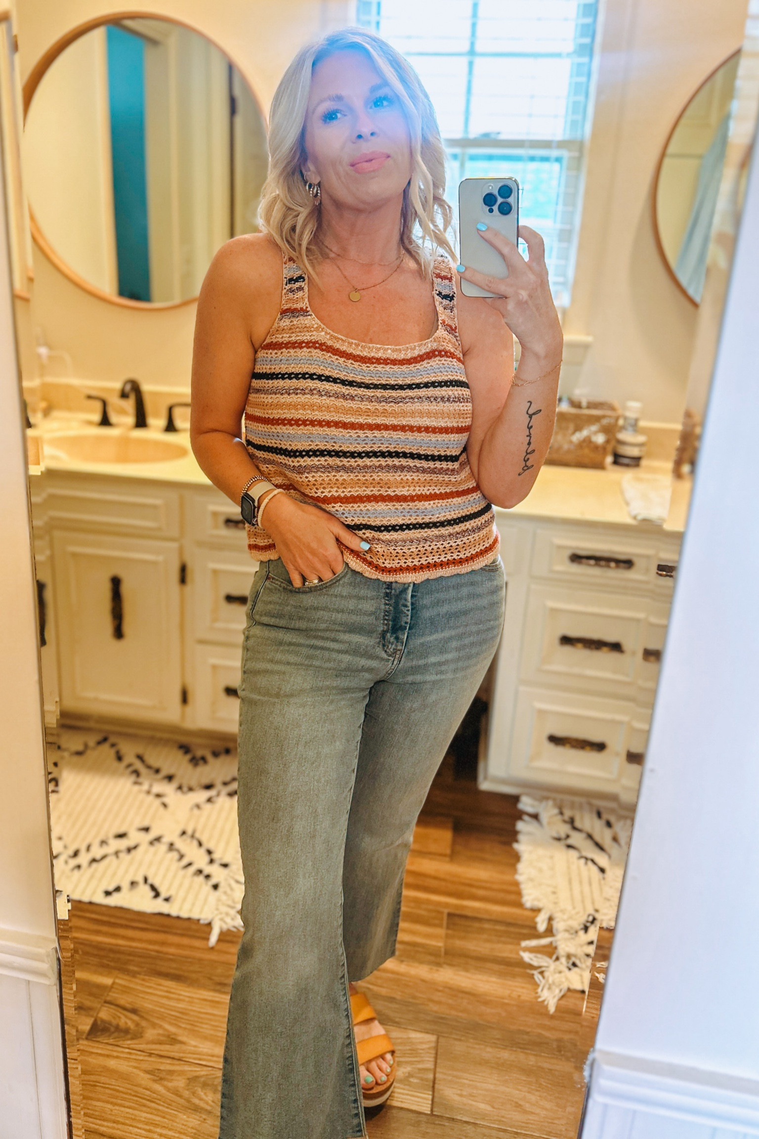 Love these jeans and crochet tank! So cute and comfy 🤩

#LTKSaleAlert #LTKStyleTip #LTKOver40