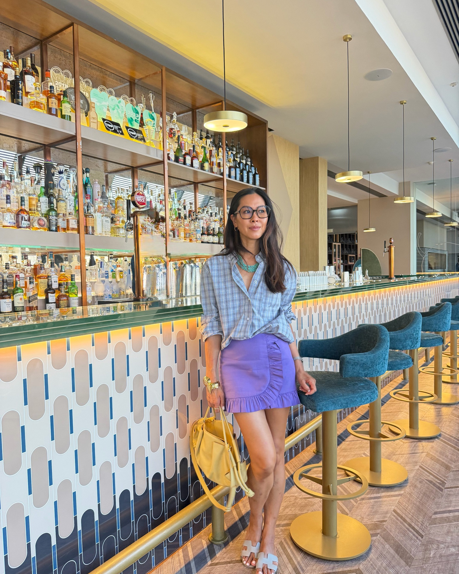 My look for cocktails and alfresco dinner. 

Wearing check shirt size medium. 
Skirt size 8
Hermes Orans in grey very old
Loewe pre loved paseo bag in large yellow 
Necklace Next
Gold jewels Beaverbrooks

#LTKsummer #LTKdatenight #LTKeurope