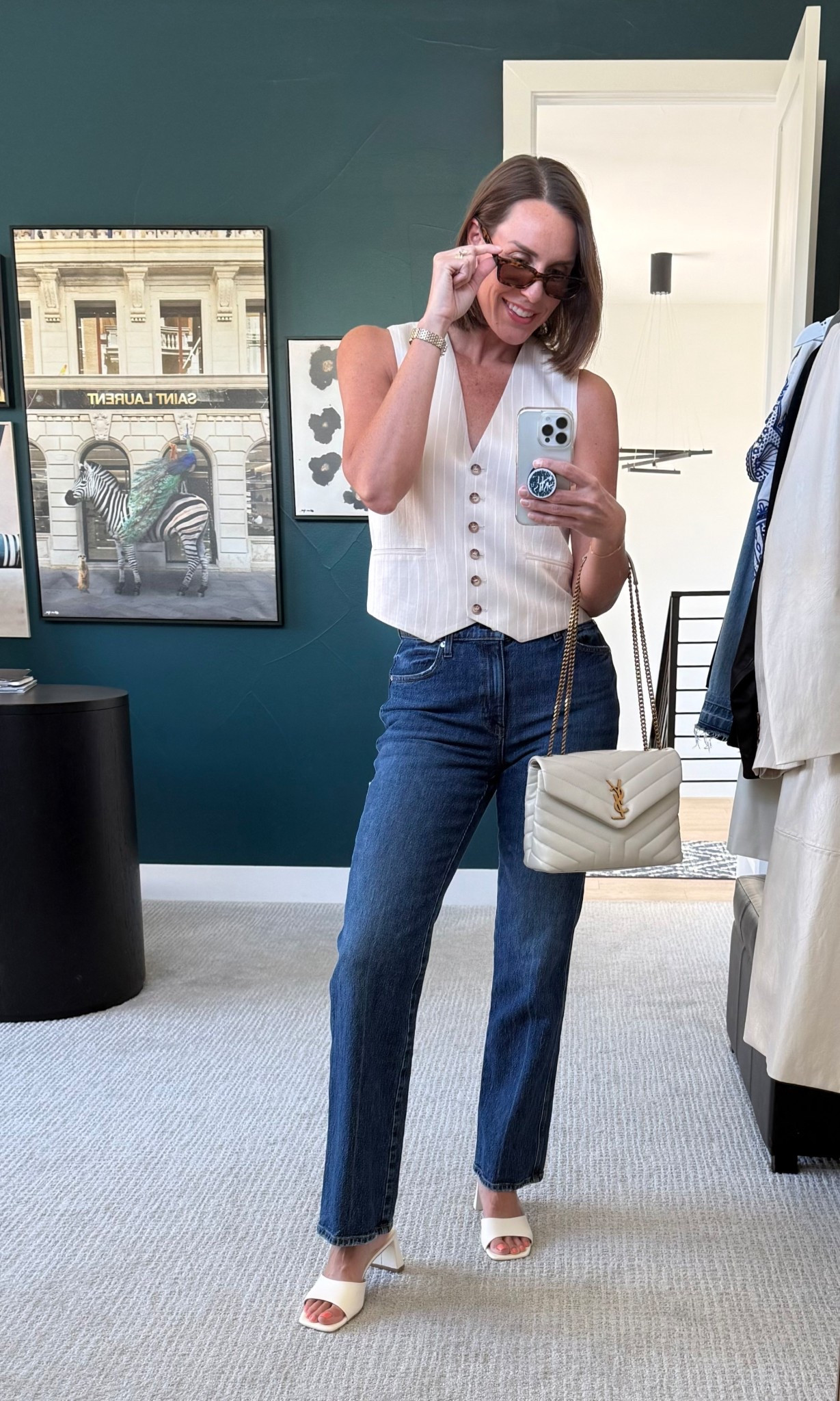 Spring casual chic. Linen vest paired with jeans, bag, heels and sunglasses. 🕶️