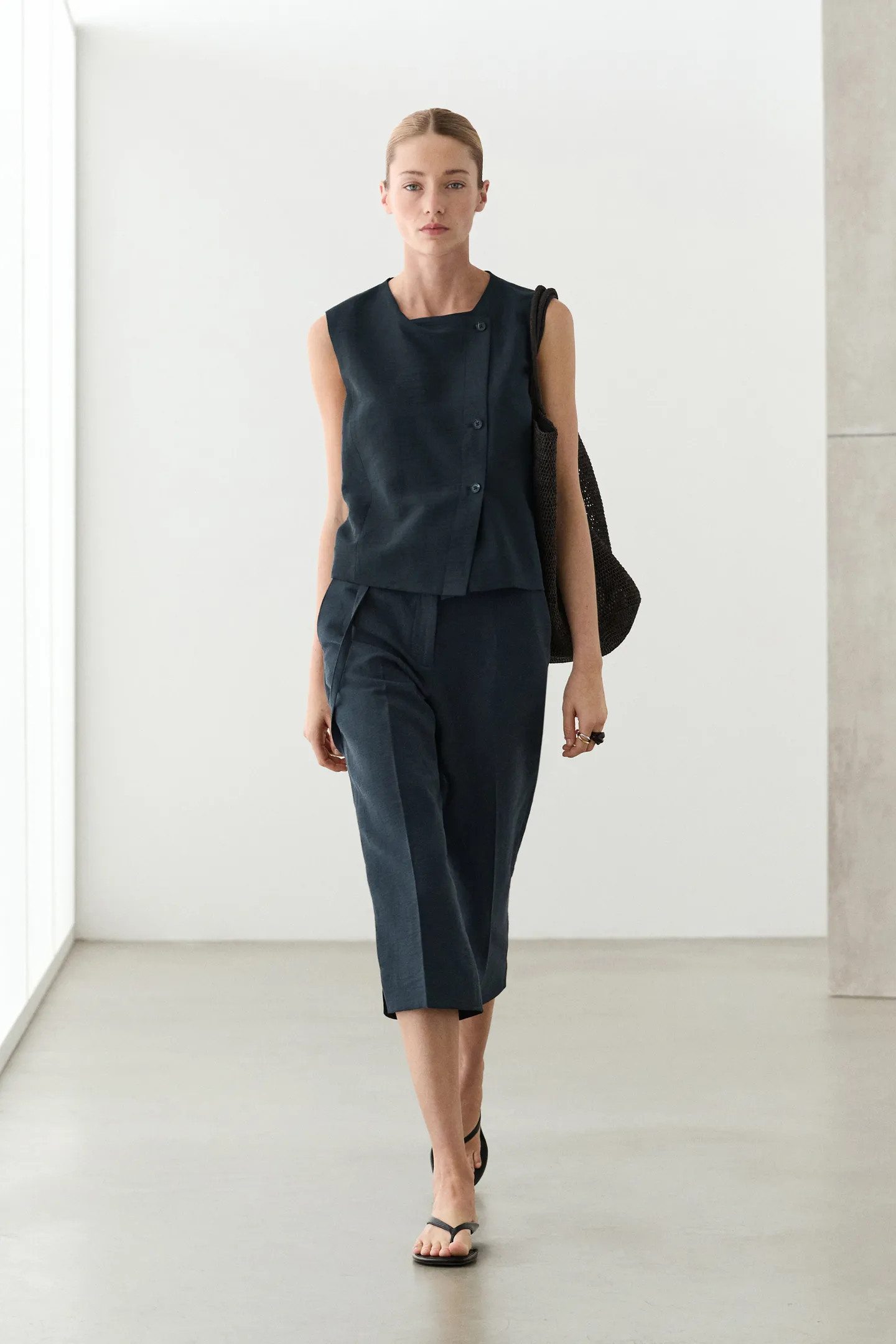 Linen asymmetric buttoned vest | Massimo Dutti UK