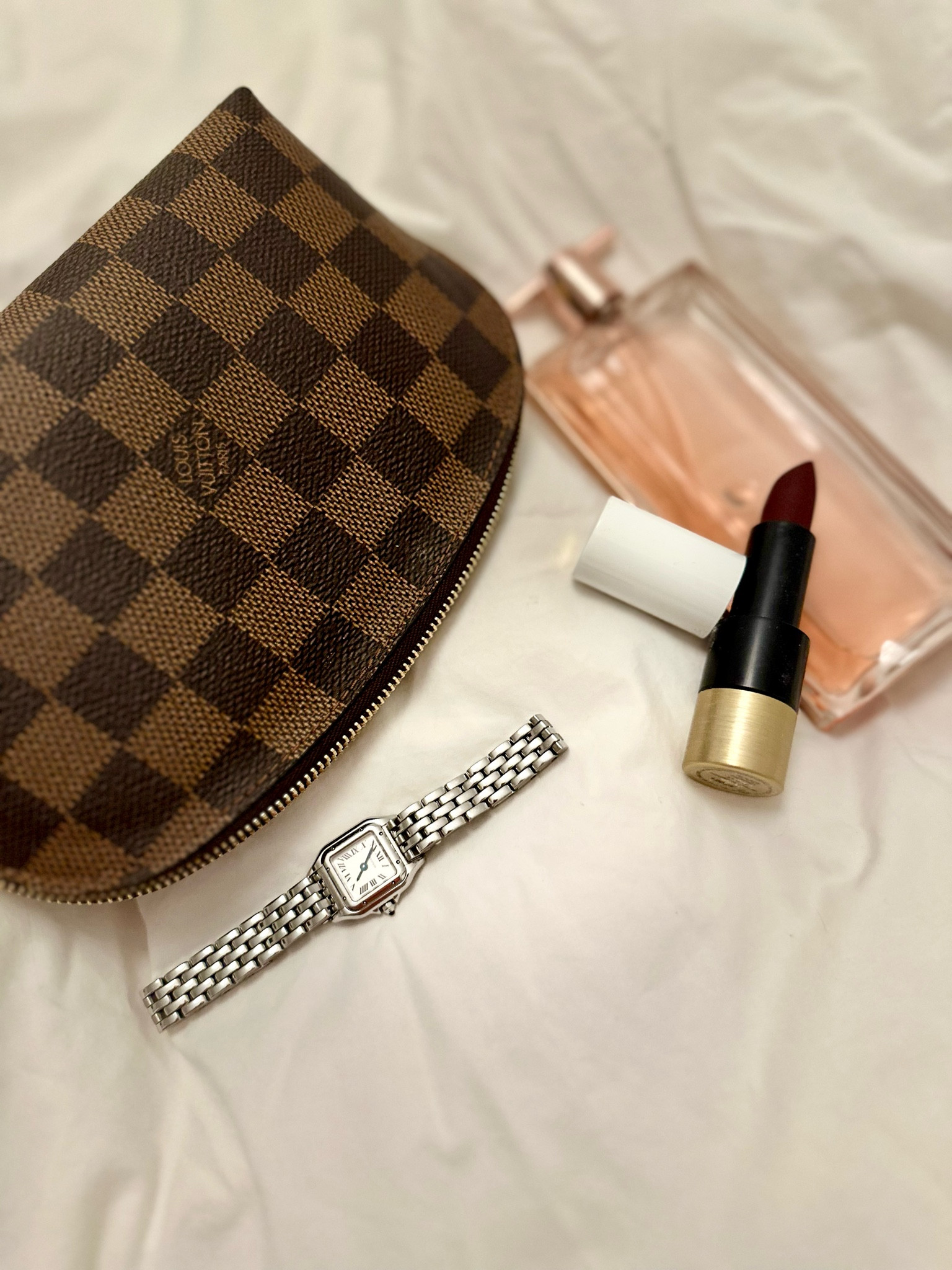 A few of my favorite things ♥️✨

Cosmetic pouch by Louis Vuitton
Cartier Panthère watch in the mini size
Perfume Idôle by Lancôme
Lipstick by Hermès beauty

#LTKSeasonal #LTKStyleTip #LTKGiftGuide