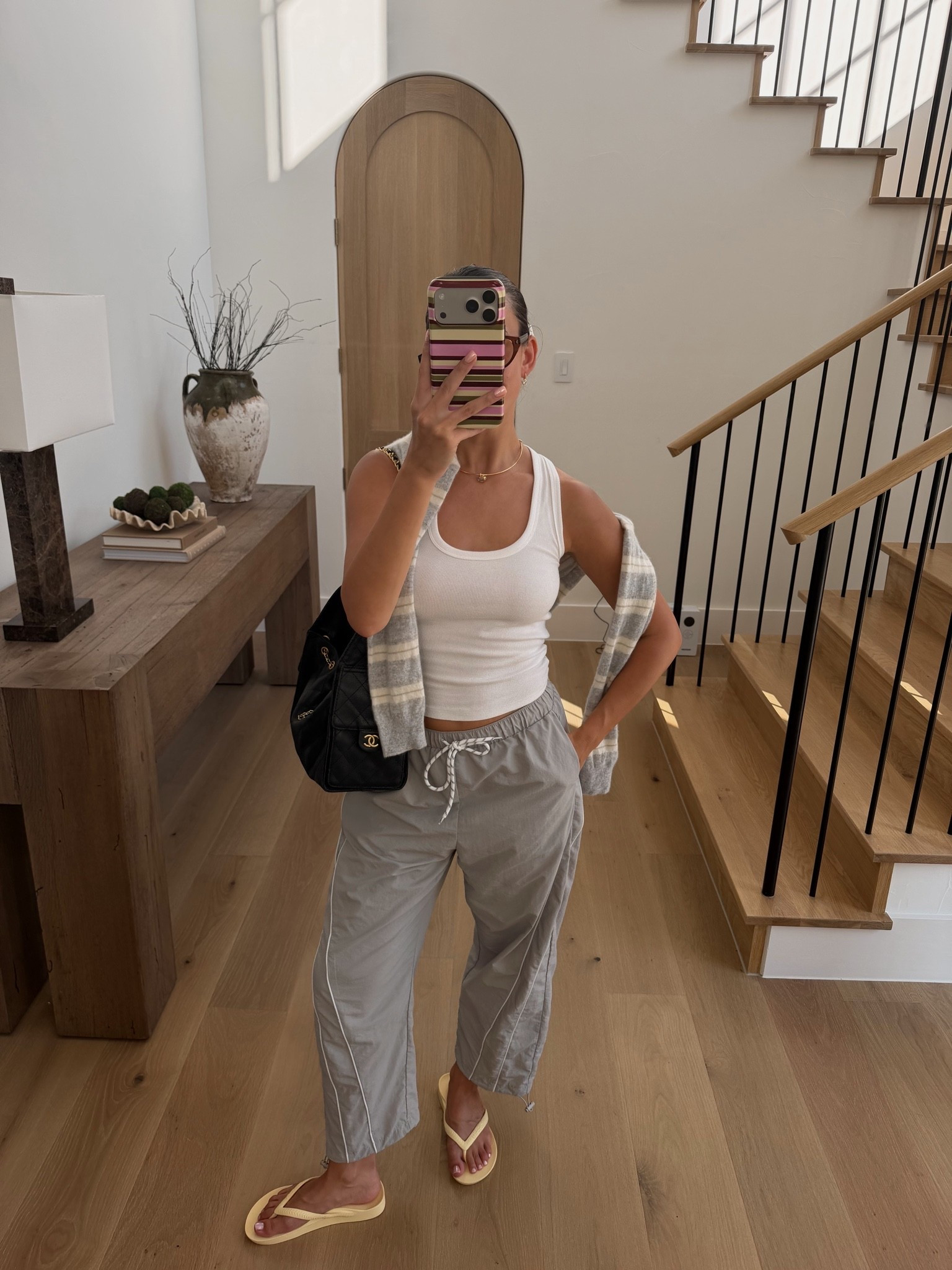 Sporty outfit of the day! Amazon track pants size small, aritzia tank + sweatshirt size small! Archie’s flip flops (my new obsession are tts!)
