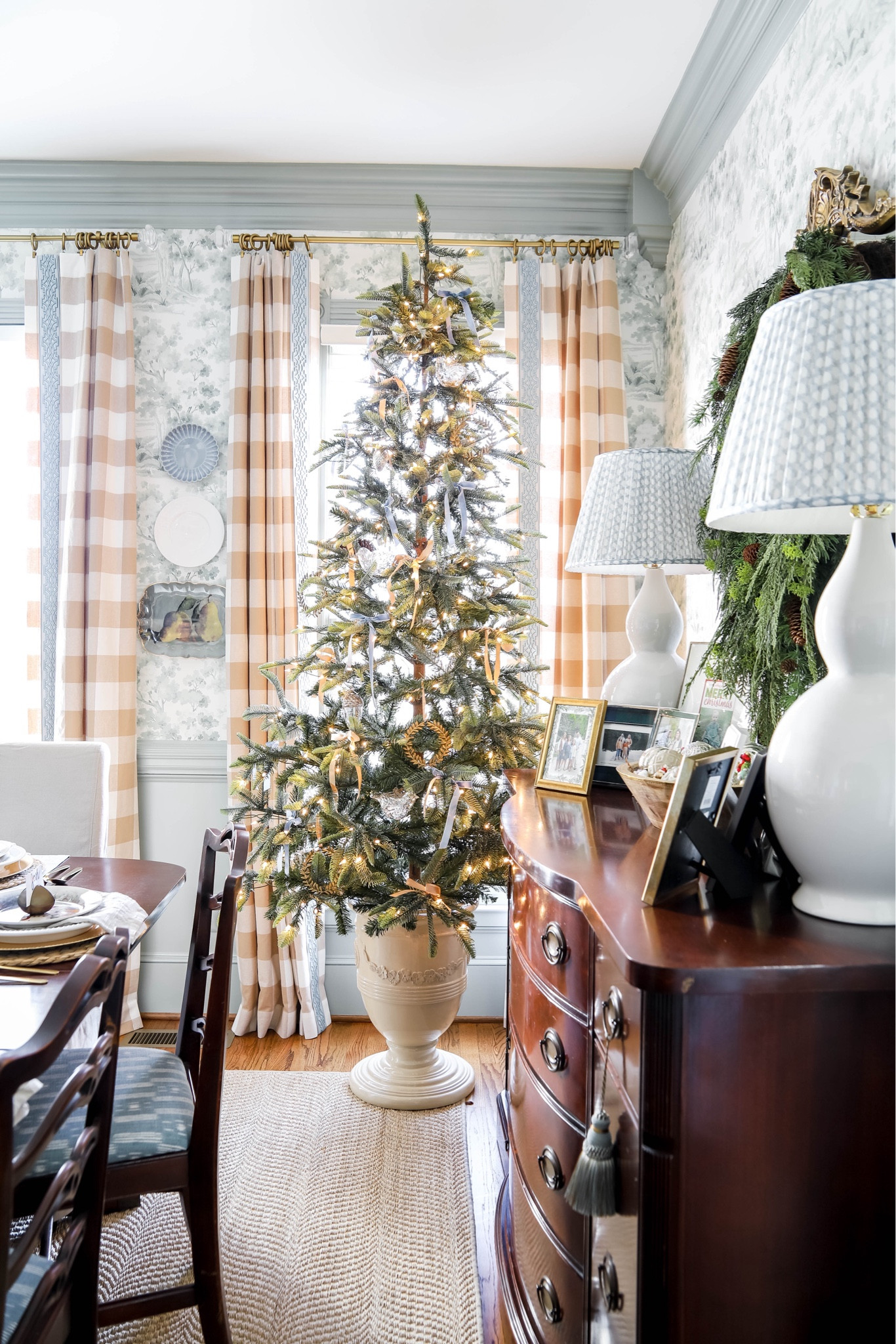 My dining room  Christmas tree is in a classic urn designed specifically for this use. I love my sparse Christmas tree, too! It looks great left bare or with a few ornaments on it! 

#LTKHome #LTKHoliday #LTKSeasonal