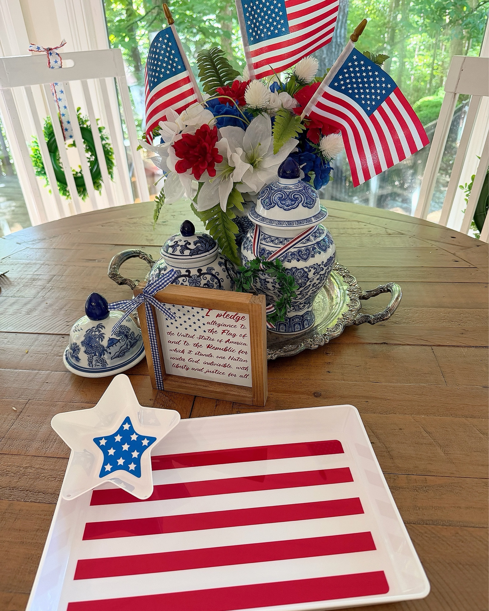 Patriotic Serving Set 🇺🇸 Stars & Stripes Tray + Preppy Americana Decor


The cutest red, white & blue setup for summer hosting 🇺🇸✨ This stars & stripes serving tray paired with the matching star bowl is perfect for chips & dip, fruit, or festive snacks for Memorial Day and the 4th of July.

Styled with classic blue & white chinoiserie ginger jars, a hydrangea arrangement with mini American flags, and a sweet framed patriotic sign tied with gingham ribbon for that timeless preppy Americana look 💙 The layered textures and pops of red, white & blue make this such an easy but elevated entertaining setup!

Everything is linked to recreate this festive table ✨

patriotic serving tray, 4th of july entertaining, memorial day hosting ideas, red white blue table decor, americana party setup, chinoiserie decor, blue and white ginger jars, hydrangea arrangement, preppy home decor, summer entertaining essentials

#LTKmomlife #LTKfoodie #LTKHome