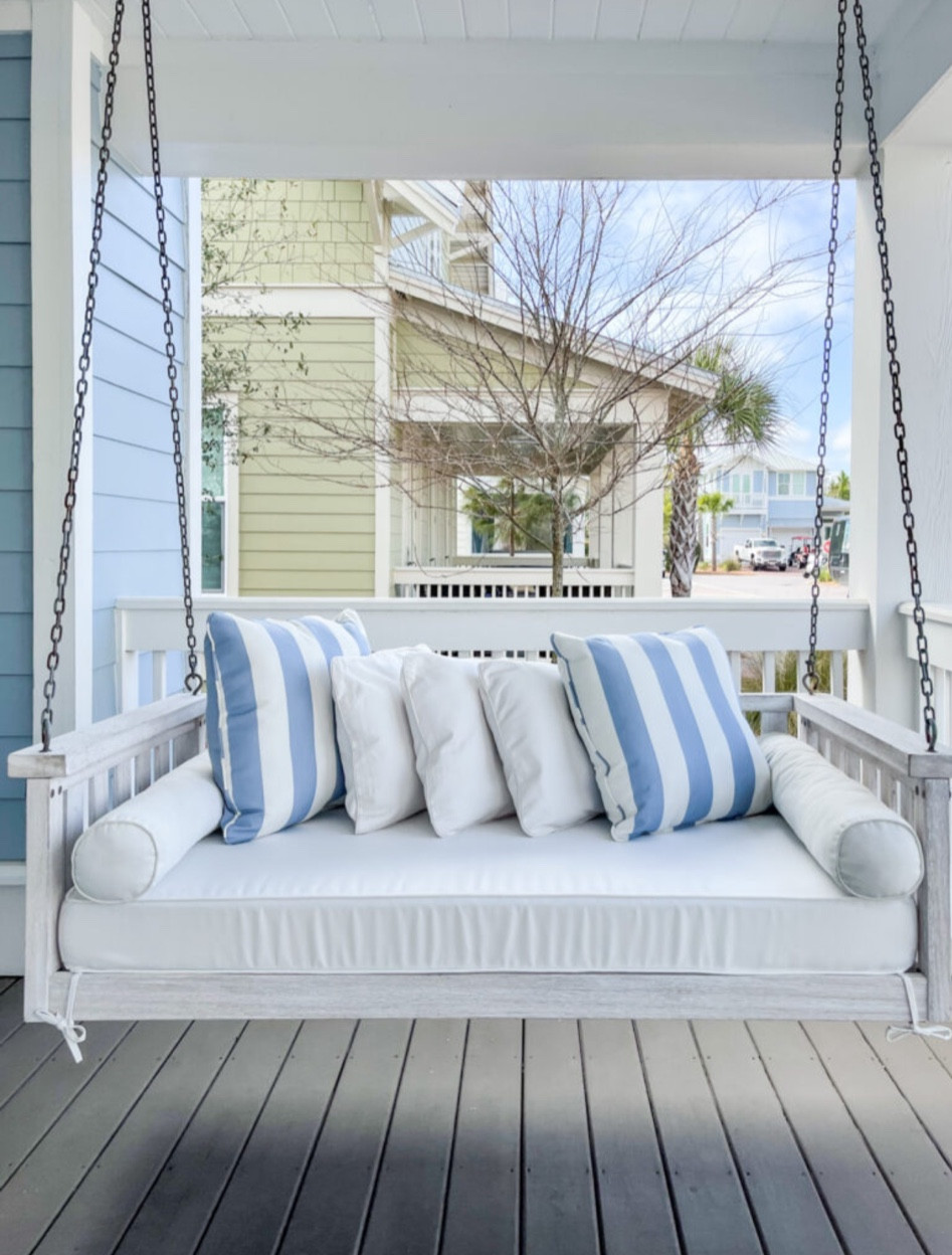 Raise your hand if you love swinging on the front porch! 🙋🏼‍♀️ This porch swing is our favorite and perfect for the beach house! These coastal throw pillows are also linked. 

porch decor, coastal home, home decor ideas, simple home decor, decor inspo, front porch ideas, porch swing decor, front porch decor, beach house, coastal vibes, coastal inspo 

#LTKsalealert #LTKunder50 #LTKunder100

#LTKstyletip #LTKtravel #LTKhome