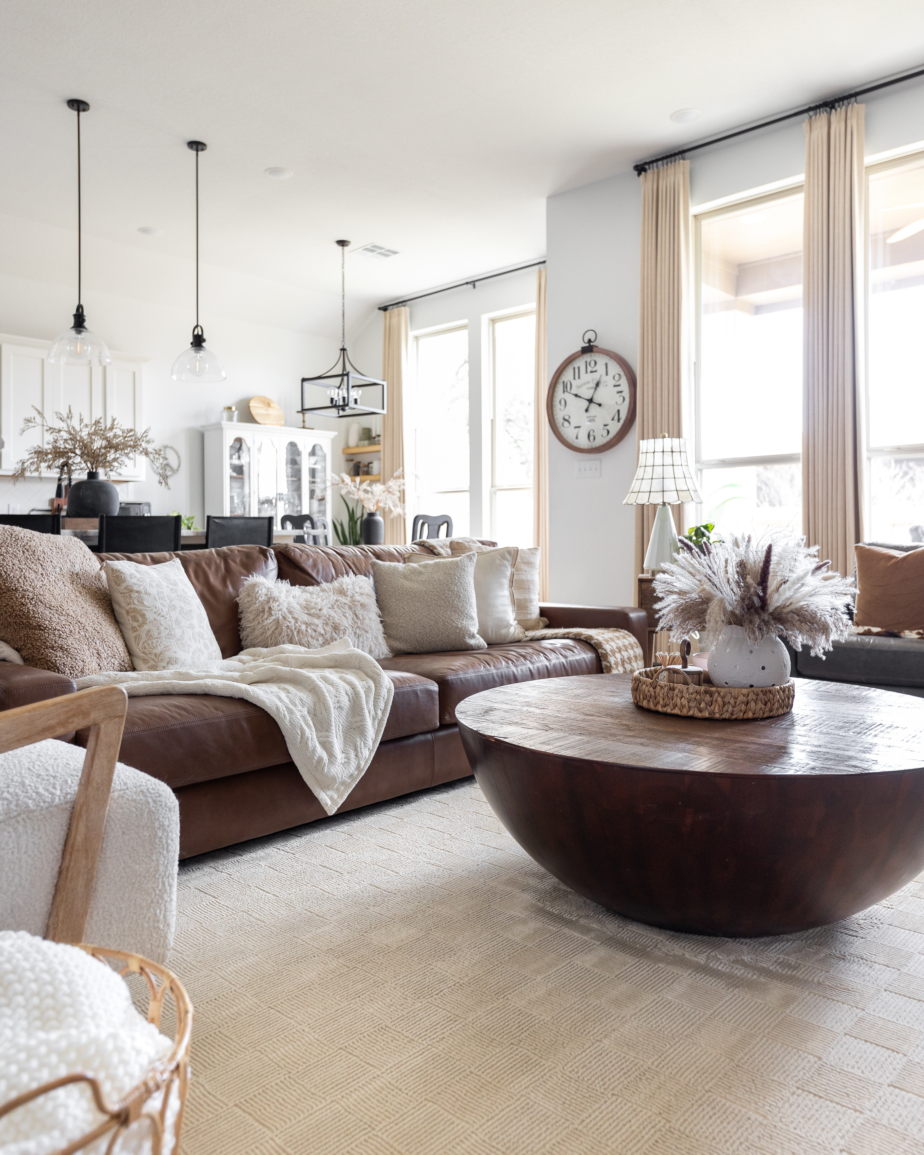 This drum coffee table is such a beautiful anchor in our living room! I love the simple shape and the warmth of the walnut-stained mango wood — it adds just the right amount of contrast to all the lighter textures in the space.

Ours is 48" wide x 16" high, which gives us plenty of surface area without making the room feel crowded.

One of the things I especially love about this table is that it can be customized through Etsy, so you can choose the size that works best for your space!

#LTKHome #LTKSaleAlert