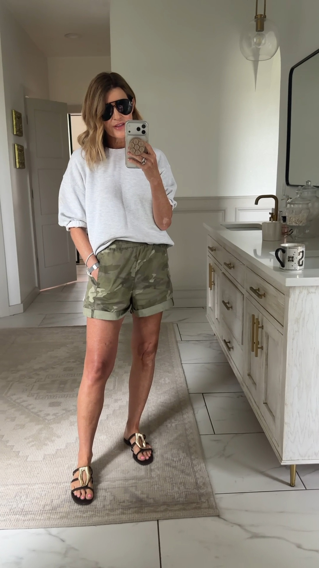 Size small shorts and size small sweatshirt
Sized down .5 in sandals

#LTKOver40 #LTKootd