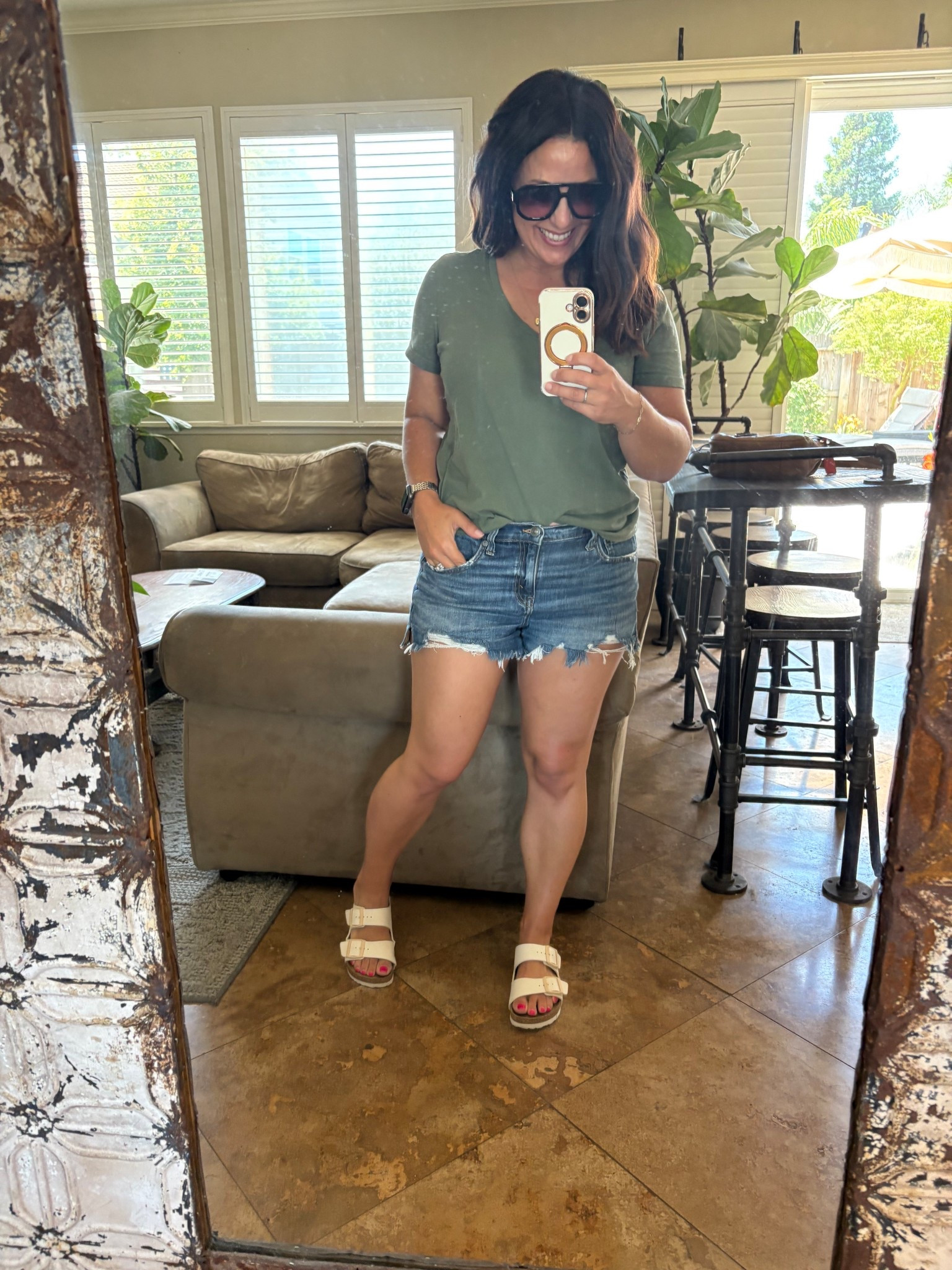 Comfort was my goal today. Lots of chauffeuring kids, errands and chores today. I’ve been told distressed shorts are not in style, but I honestly don’t care. These shorts are so comfy, have an elastic back waist is button and zipper front closure. I loved them so much I bought them in 3 washes. I’m wearing a small, they are currently on sale for $20. 

#LTKOver40 #LTKSaleAlert #LTKPetite