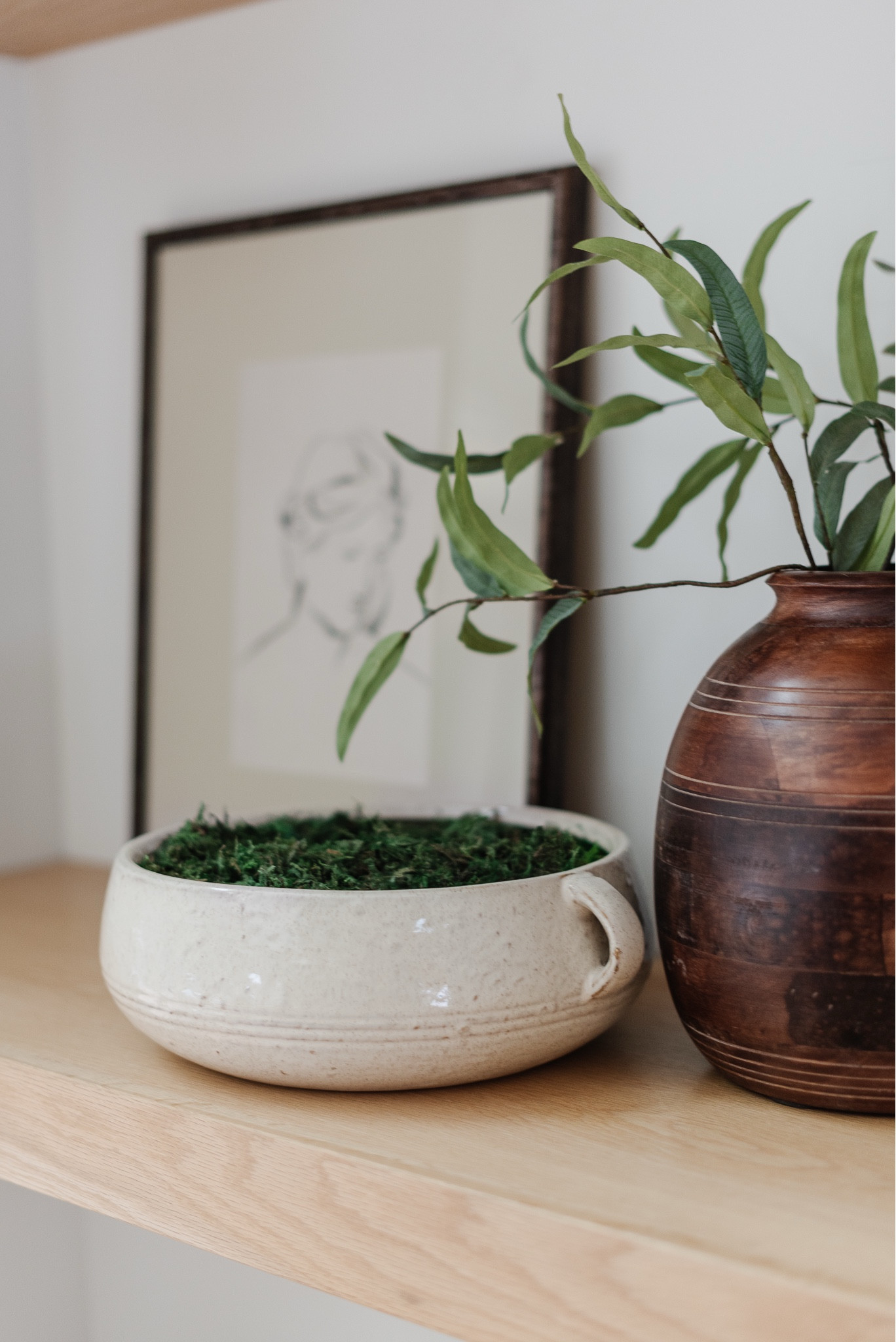 Shop the shelfie. Love this designer look bowl that’s just $30.  It’s super oversized & I love the handles.  Use code LINDSEYPEDEY for 10% off the wooden vase at McGee & Co. 

Shelf decor, home decor,
Moss, vase, spring, branch, faux stem, Amazon home, Amazon find, mcgee and co, studio McGee, frame, art, hearth and hand, target 

#LTKMostLoved #LTKHome #LTKStyleTip