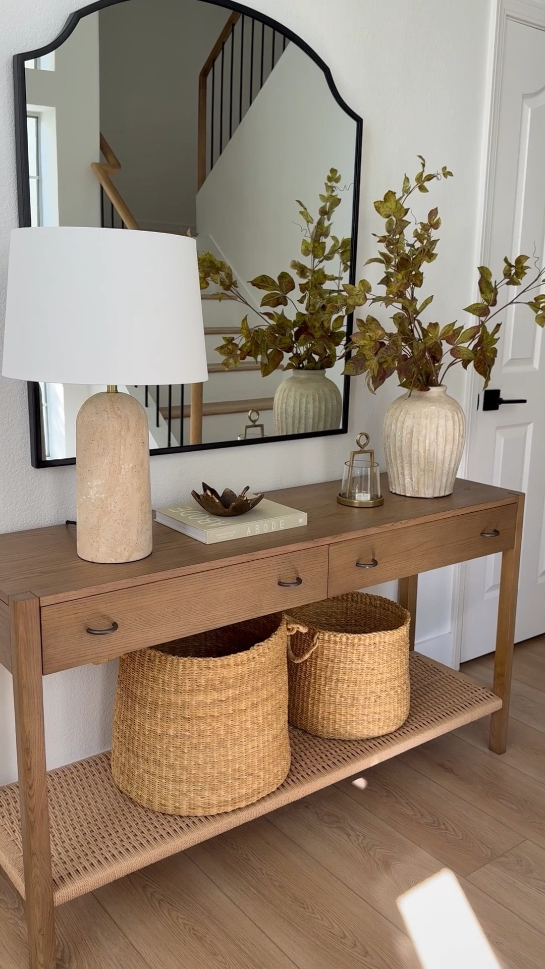 Entryway styling inspiration! Loving the warm tones and mix of textures. These realistic and gorgeous stems are my favorites for fall decor. I styled 3 in this vase  

Console table, travertine lamp, fall stems, vase, storage baskets. Pottery Barn, Afloral, Wayfair, Crate and Barrel, Target finds  

#LTKStyleTip #LTKHome #LTKSaleAlert