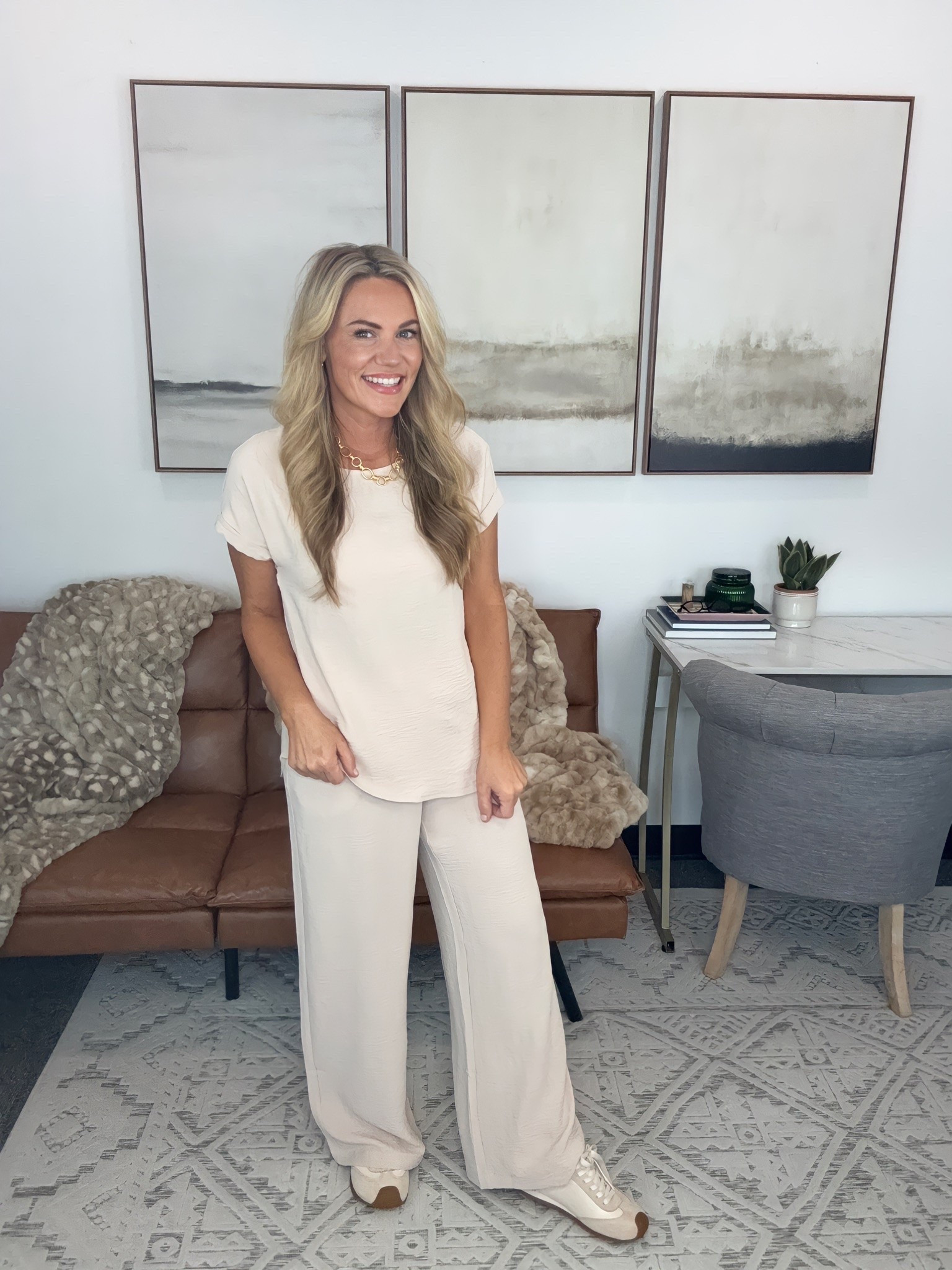 An outfit I could wear straight from a flight into a full day of plans. The relaxed top and flowy wide leg pants are comfortable for hours of travel, and the neutral color makes it easy to accessorize.

airport style, neutral two piece set, comfortable outfit, travel fashion, wide leg pant set, casual travel outfit, matching set, womens travel outfit, neutral style, everyday outfit, AudrieDollins

#LTKootd #LTKOver40 #LTKSeasonal