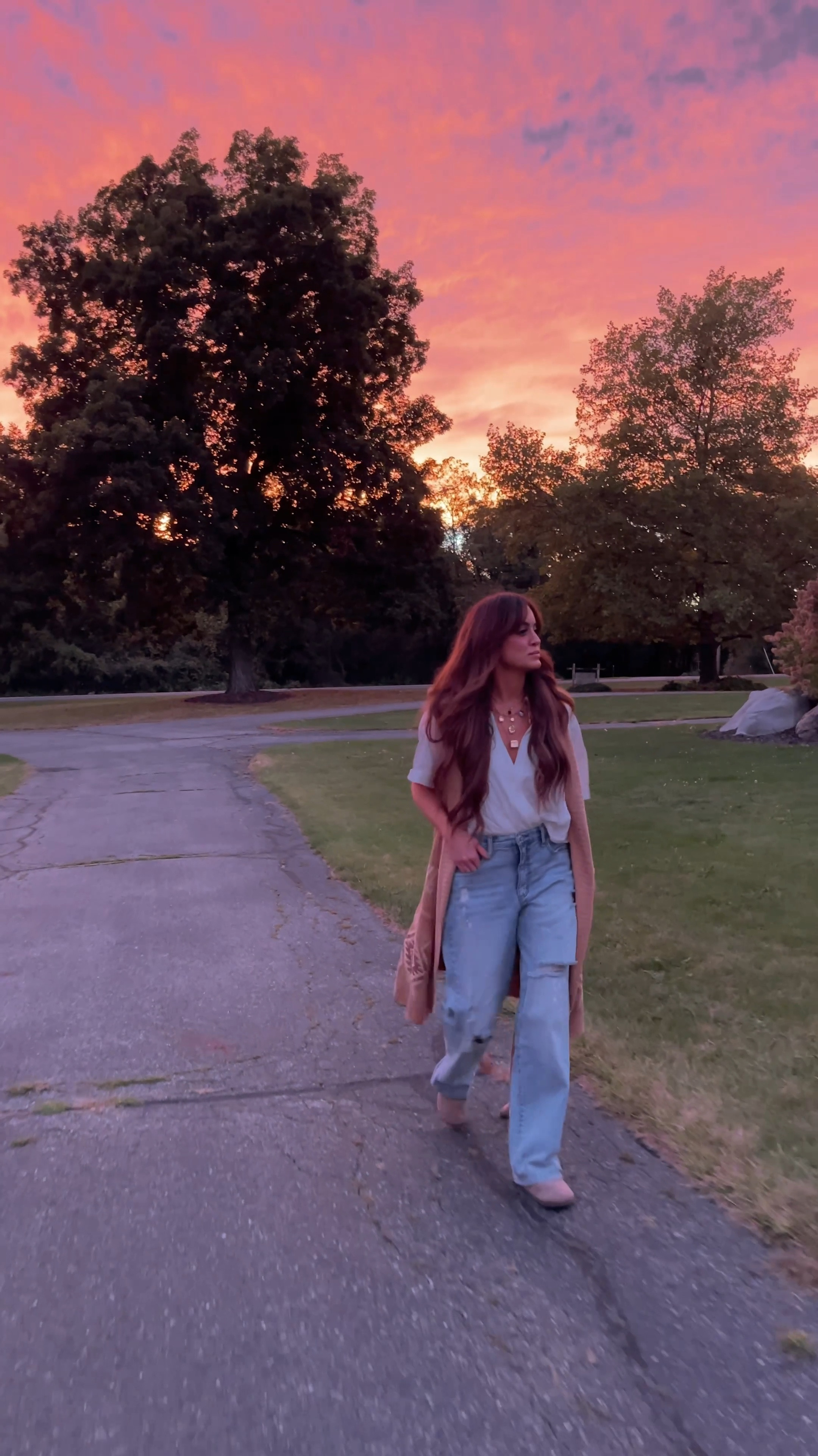 Cozy mom fit. A favorite pair of jeans that are finally back in stock, & one of my favorite flowy layering tees that is also on sale! Paired with a thrifted vest & my favorite shoes for fall. 

Jeans, shoes, & shirt are all tts 

#LTKSeasonal #LTKSaleAlert #LTKVideo