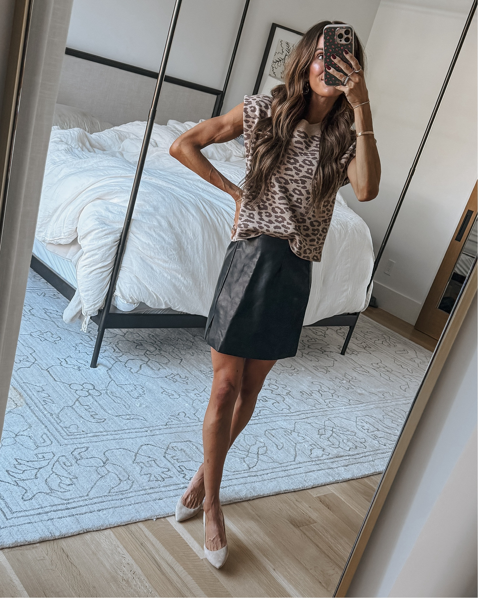 obsessed with this skirt + leopard sweater tank combo 🫶🏻 get 30% off with code LAUREN30 at @anthropologie 
#anthropartner 