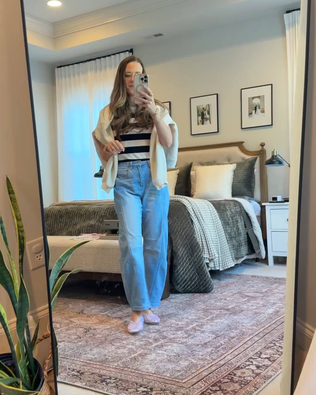 I’m normally not one for trends, but the clear jelly flats were too cute to pass up 🤍 Styled them with this navy and cream striped top and my Amazon barrel jeans for an easy casual mom outfit that still feels fun and current. Added a lightweight sweater over the shoulders for a little polish.

#LTKmomlife #LTKootd #LTKgrwm