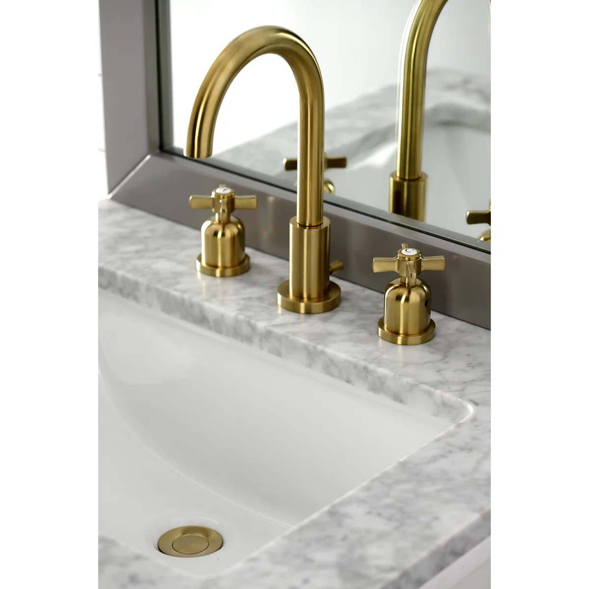 Kingston Brass Millennium Two-Handle 3-Hole Deck Mount Widespread Bathroom Faucet with Brass Pop-... | Wayfair North America