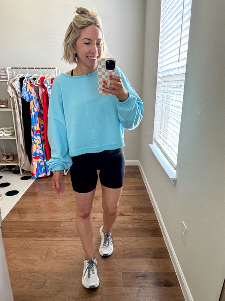 Sweatshirt perfect for Summer - comes in other colors and true to size 

Wearing size small - oversized fit 

Bike shorts in size small - color black (also have them in charcoal gray color too)

Sneakers sized up 1/2 size 

#LTKSaleAlert #LTKFindsUnder50 #LTKActive