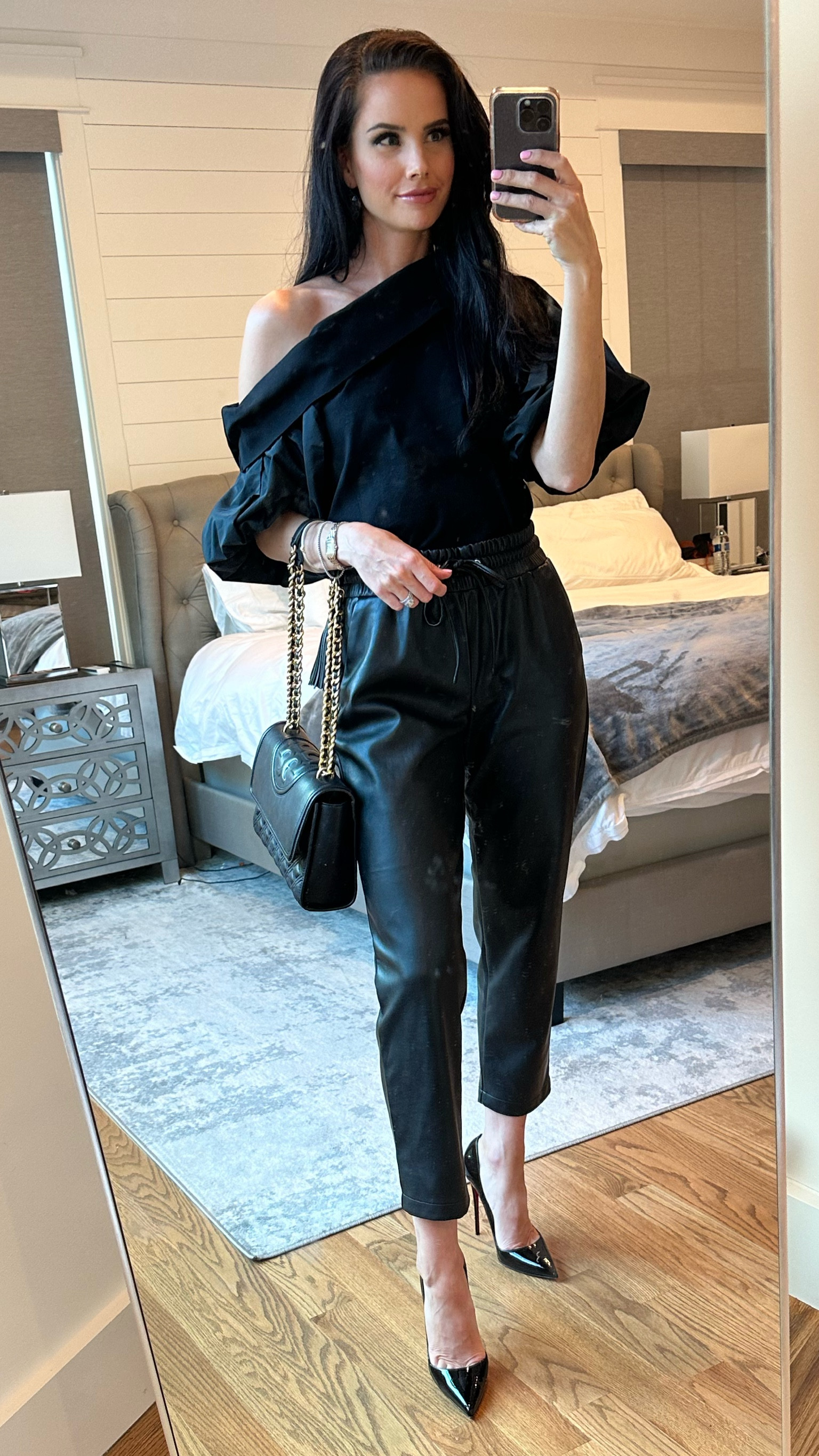 Date night outfit. These faux leather joggers are so easy to dress up or down. 

Leather joggers. Leather pants. One shoulder top. Puff sleeve top. Black stiletto heels. Black leather purse. 

#LTKshoecrush #LTKitbag #LTKstyletip
