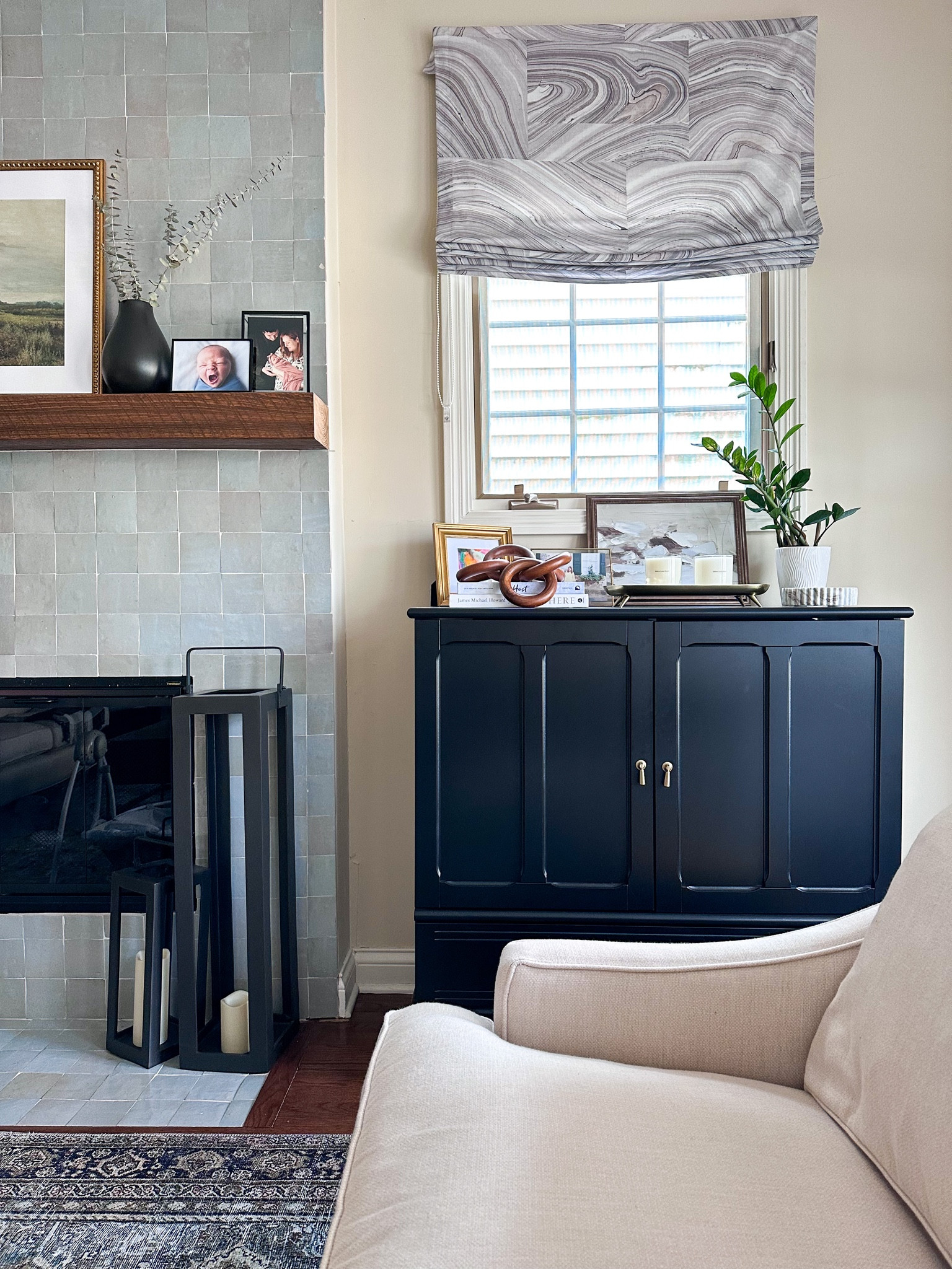 Transitional living room with budget friendly storage cabinets and slope arm sofa

#LTKhome