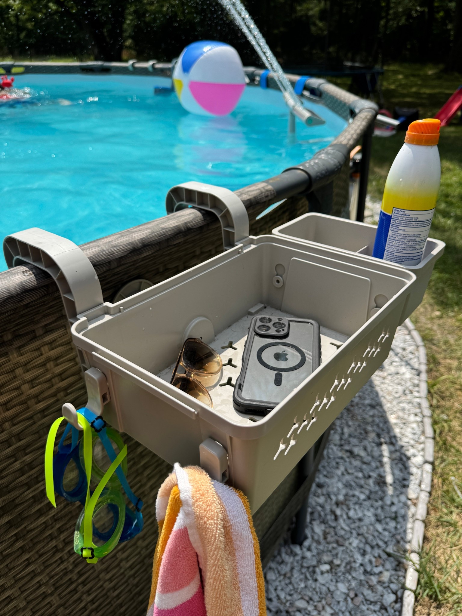 💦 These hanging pool bins keep all the essentials off the ground and within reach.. goggles, sunscreen, phone, sunnies, and a spot for your towel too. #abovegroundpool #poolaccessories 

#LTKSwim