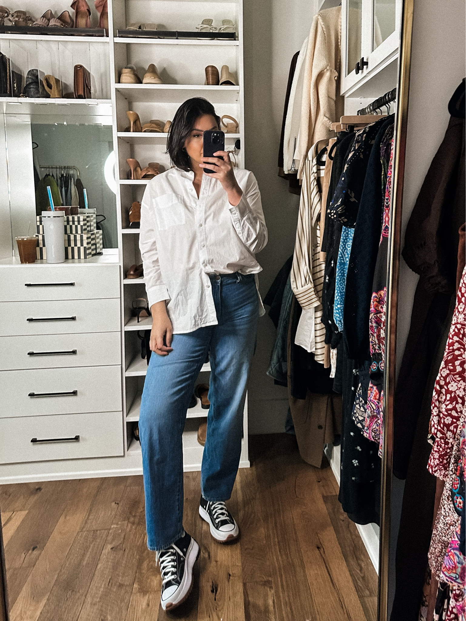 I love these jeans. This is the slouchy boyjean and I know that right now their skinny flares are all the rage — and I’ll give those a chance, too. But these are adorable and  they fit like a dream. Let me break it down.

- Hips are a tighter fit in a good way, like a flattering way and then they loosen at the waist and the thighs. It gives a vintage, masculine look.
- The length is right for me and gives a modern take on this look. Instead of going full length AND a loose leg, when the hem hits the top of your shoe its a more flattering / modern look. 
- A great mid-wash which works year round and is a more classic hue that is better when going for a different cut than you’re used to. 

If you used to like boyfriend jeans, these are for you! A modern take on that look. I am in the 29, I find them true to size, not running big for me. 

Okay so this one is your classic white blouse. I like that it’s oversized because as a lady with boob probz I tend to steer clear of button down shirts because of the gaping problem. When a button shirt is oversized, this problem is non existent and that is wonderful. This shirt in particular fits PERFECTLY oversized in your typical size. It’s correct on my shoulders, but the length and the width of the shirt is oversized without feeling boxy. 

I am in the medium, fit is TTS. 

#LTKstyletip #LTKunder100