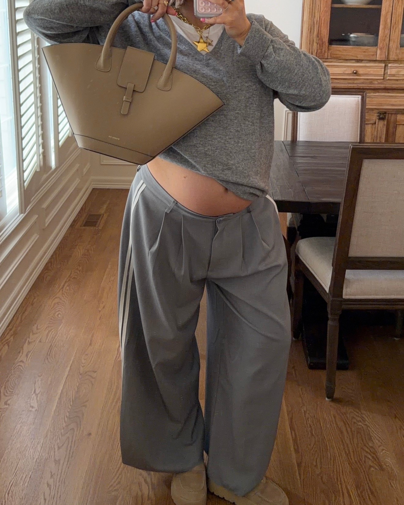 Linked similar sweater. Lioness track pants size L and I cut three inches off the bottom because they were soo long. FP movement tee size L I love the fit. Bracha jewelry. Will link similar bag (this is Paris 64 brand) Prada loafers my go to shoes I wear all the time true to size  

#bresheppard #babybump #pregnancy #lioness 



#LTKBump #LTKgrwm