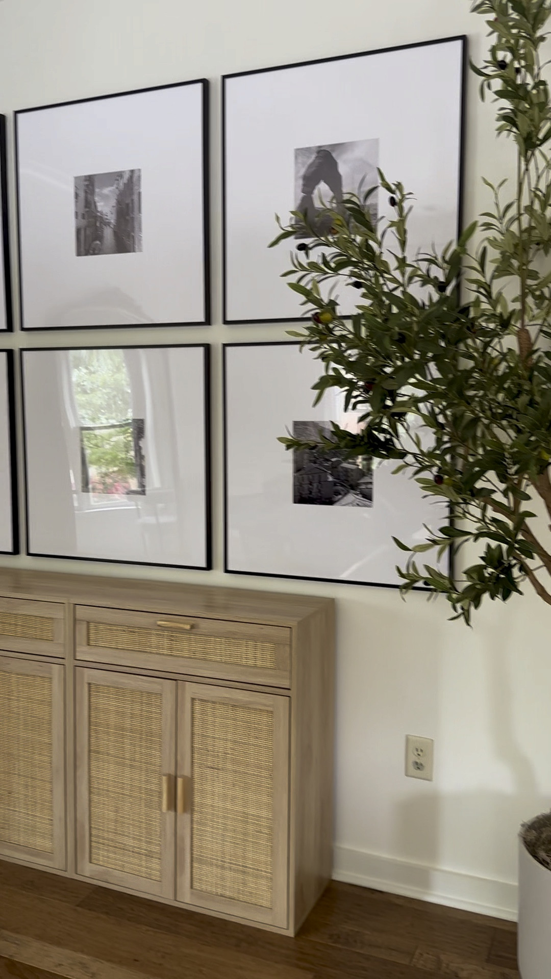 DIY gallery wall complete! It’s so nice to have pictures of our family trips off our phones and on the walls of our home. @frameiteasy frames are so beautiful and easy to use. Here are my exact frames: 
    Art Size: 10" x 10"
    Outside Frame Size: 27 3/16" x 27 3/16"
    Style: Ashford, in Satin Black
    Matting: 8 1/2" Smooth White (White Core)
    Cover: Clear Acrylic
    Backing: Acid Free Foamcore
#frameiteasy 

#LTKVideo #LTKFamily #LTKHome