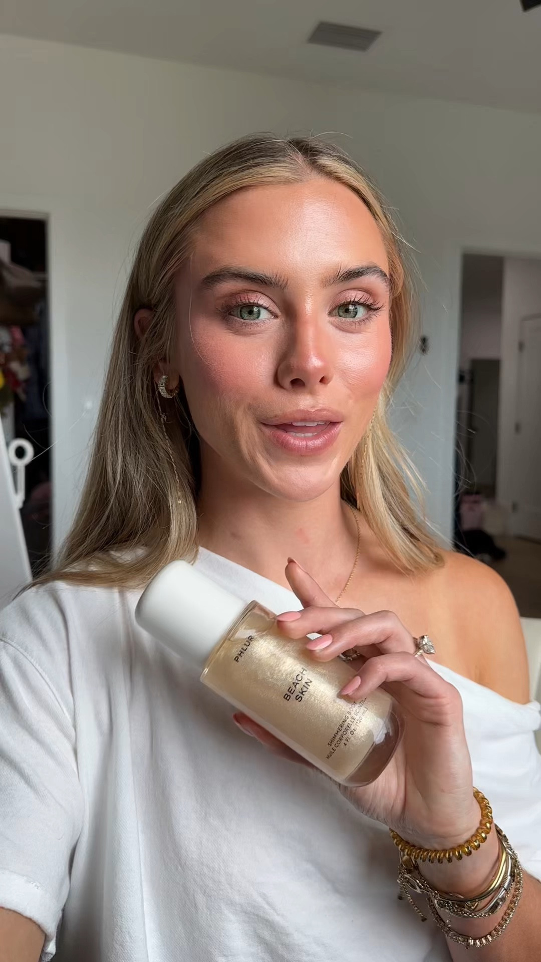 @PHLUR    silky, lightweight body oil with a sheer wash of golden shimmer, infused with skin-mimicking lipids and floral oils to help support a healthy-looking skin barrier. Scented with the fresh solar scent of Beach Skin, evoking salty air, fresh coconut milk and bright bergamot. Designed to layer seamlessly with Beach Skin Body Mist or your favorite fragrance for a soft, sunlit finish.

#LTKgrwm #LTKselfcare #LTKBeauty