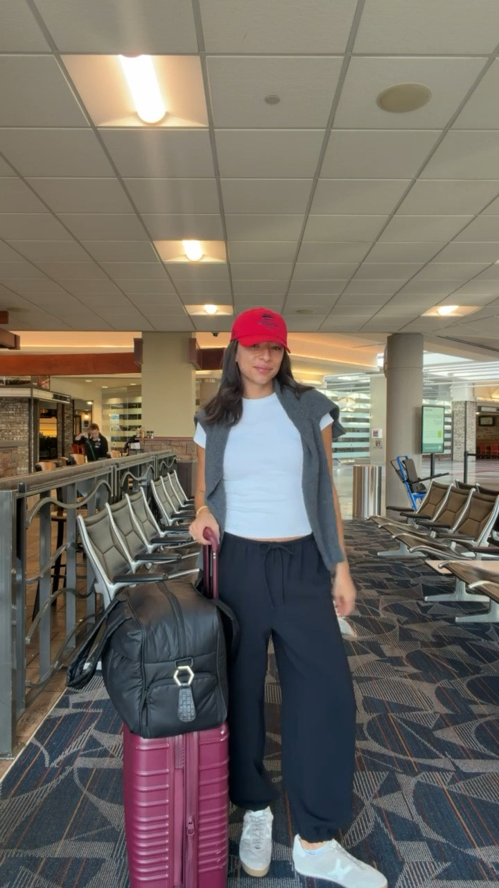 Airport outfit for NYFW ✈️ I love this cute and comfy travel outfit and it makes me still feel put together while traveling! Wearing size S white tee, size S grey sweater and size S balloon pants (Exact luggage color is OOS but I’ve linked similar)

#LTKTravel #LTKNYFW #LTKSeasonal