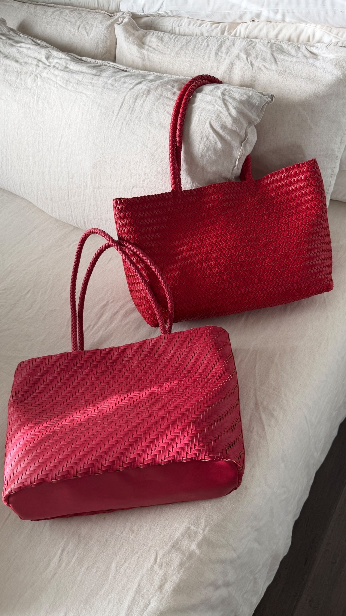 Same vibes. Different qualities but both so cute! A really pretty addition to your summer closet. Such a pop of color!  Click on the links for other color options! MADEWELL’s is made of real leather, SUPER SOFT and I kept this. The Target is super cute in its own right but very stiff and structured. If you’re looking for something to keep for years, the Madewell tote is for you. IG you’re looking for a seasonal pop of color bag that looks great, Target will reallly do.

#LTKmomlife #LTKOver40 #LTKSeasonal