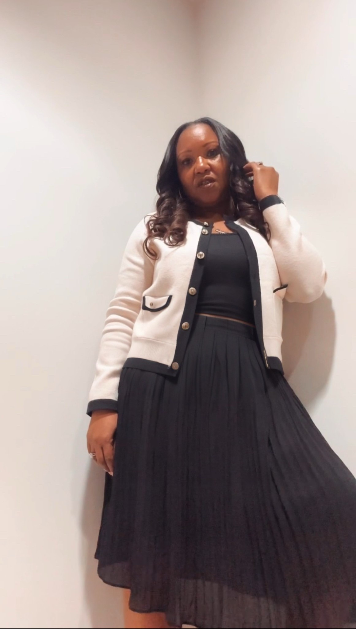 Closet staple alert 🖤🤍
This cropped cardigan with gold buttons and contrast trim is giving timeless elegance! I paired it with a pleated midi skirt and a black tank for a polished look you can take from desk to dinner. Tap to shop this full look and elevate your everyday style✨

#LTKSummerEdit #LTKWorkwear #LTKStyleTip