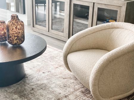 Boucle Swivel Chair Tapioca / Pedestal Coffee Table Black / Glass Vases Tortoise / Thick Cloud-pile Area Rug 

#LTKhome