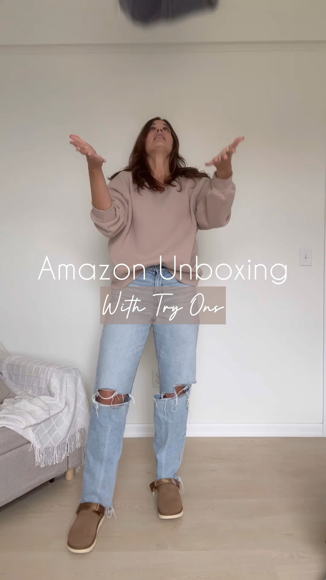 ivory blazer / brown double lined tank / long navy puffer coat / fuzzy fleece ivory pullover sweatshirt / black and white split hem long sleeve top / beige and black trim crewneck sweater / brown teddy cardigan / red henley top / ugg goldenstar clogs

#LTKVideo #LTKSeasonal #LTKMidsize