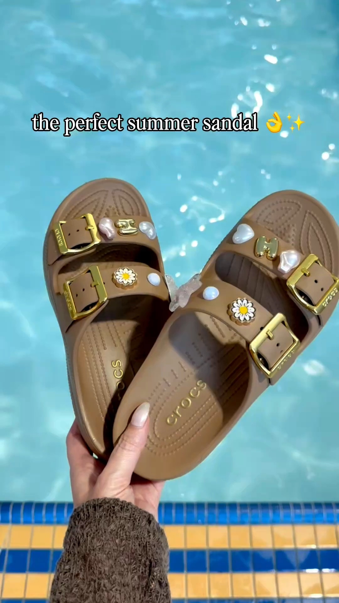 When I tell you I am SO happy I found the perfect summer sandal 😍 These viral crocs sandals just restocked + this is your sign to grab a pair. So comfortable (but also, really cute with the gold buckle and fun charms). Fits true to size. 

Linking 🇨🇦 first, 🇺🇸 second

#LTKcanada #LTKshoes #LTKswimwear