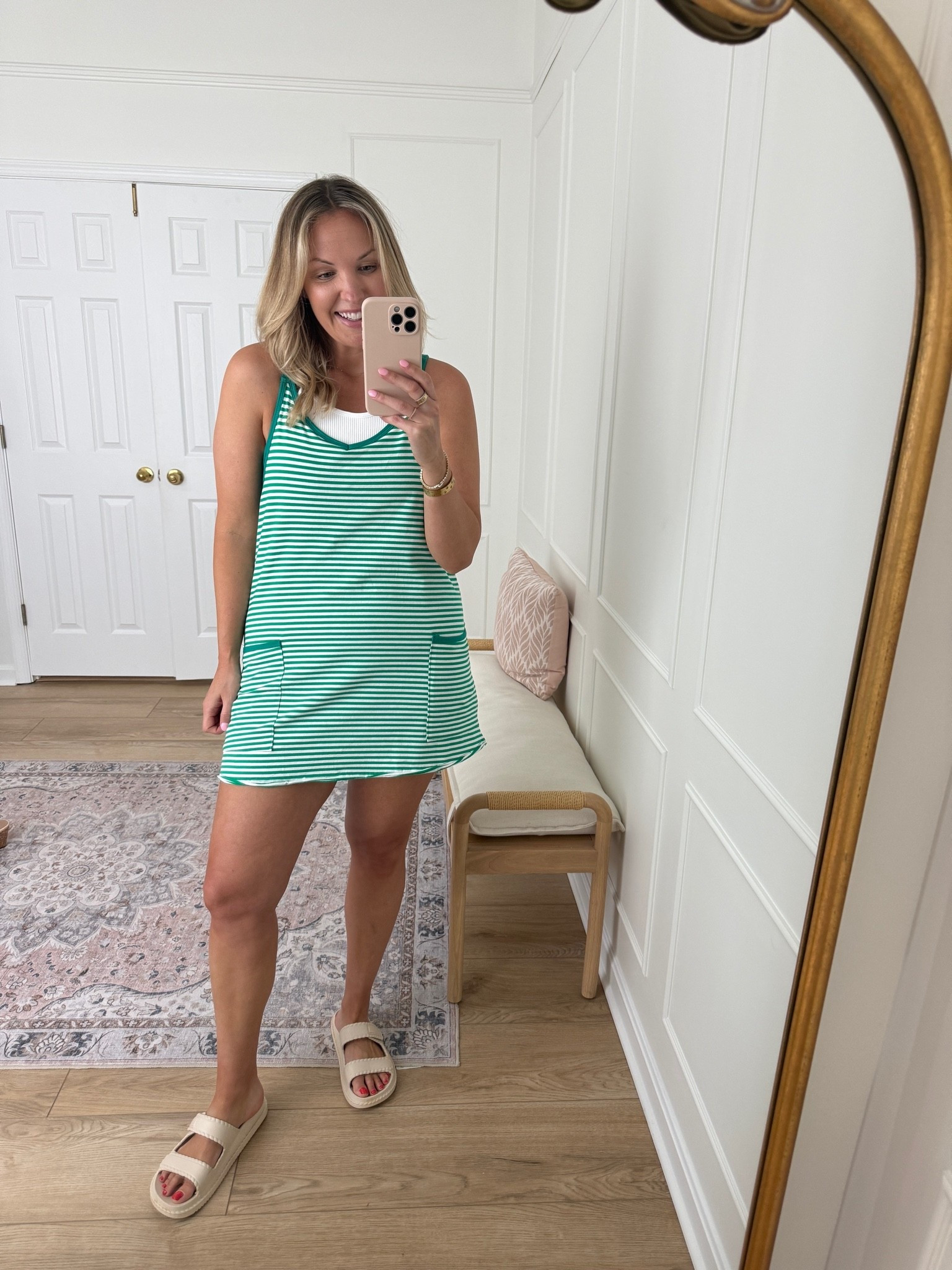 Love the green strips! Built in shorts - wearing a med