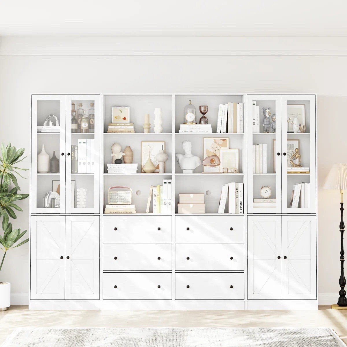 Inspired by boutique hotel libraries and European interiors — this bookcase adds depth and quiet luxury to any room. A large, statement piece with generous shelving. ON SALE and under $600.

Bookcase Dimensions: 70.9'' H X 94.48'' 

Keywords: Bookcase, bookshelf, large bookcase, bookcase with drawers, glass bookcase, home office, home library, reading room, home decor, home refresh

#LTKSaleAlert #LTKSeasonal #LTKHome