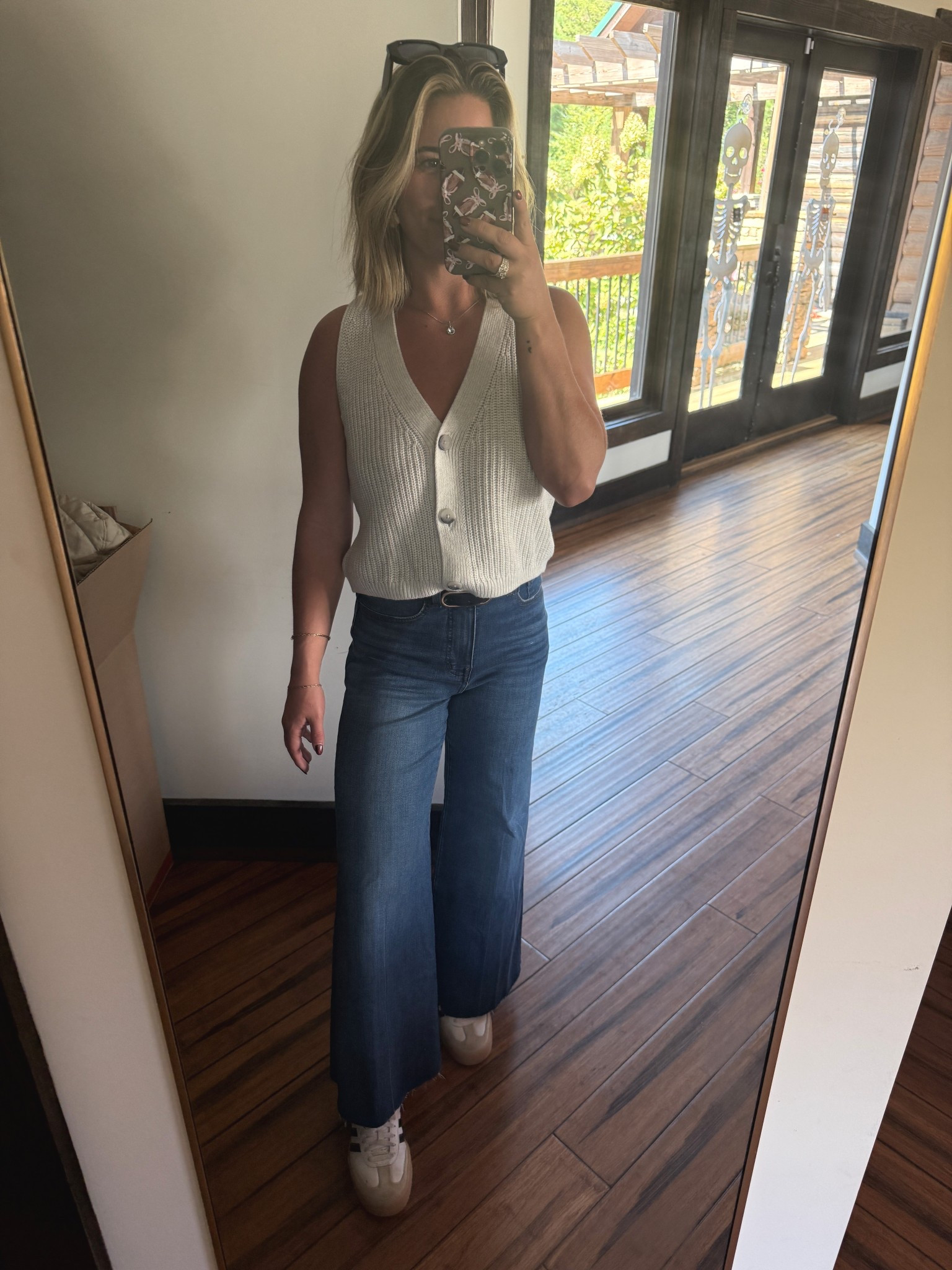 This little sweater vest is so dang cute! Wearing small. Jeans are so flattering! High waisted and flare bottom with raw edge. Perfect for petite/shorter gals! 

#LTKPetite #LTKStyleTip #LTKFallSale