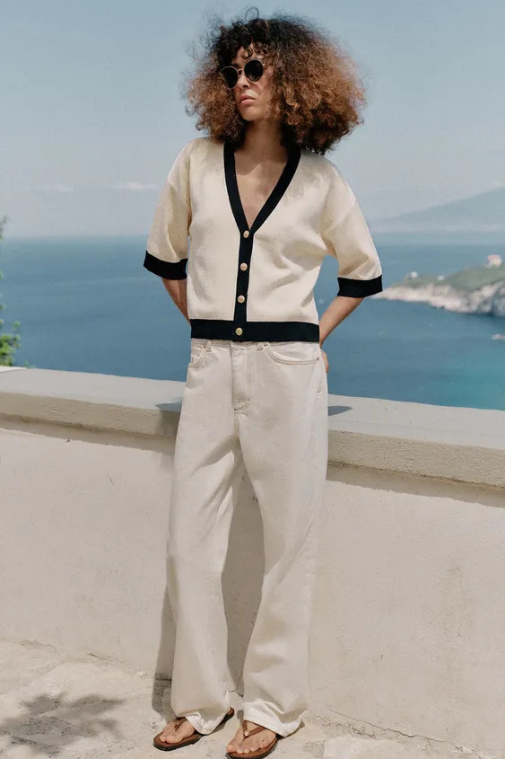 Knit cardigan with a V-neck and elbow-length sleeves. Featuring contrast binding trims and a butt... | Zara UK