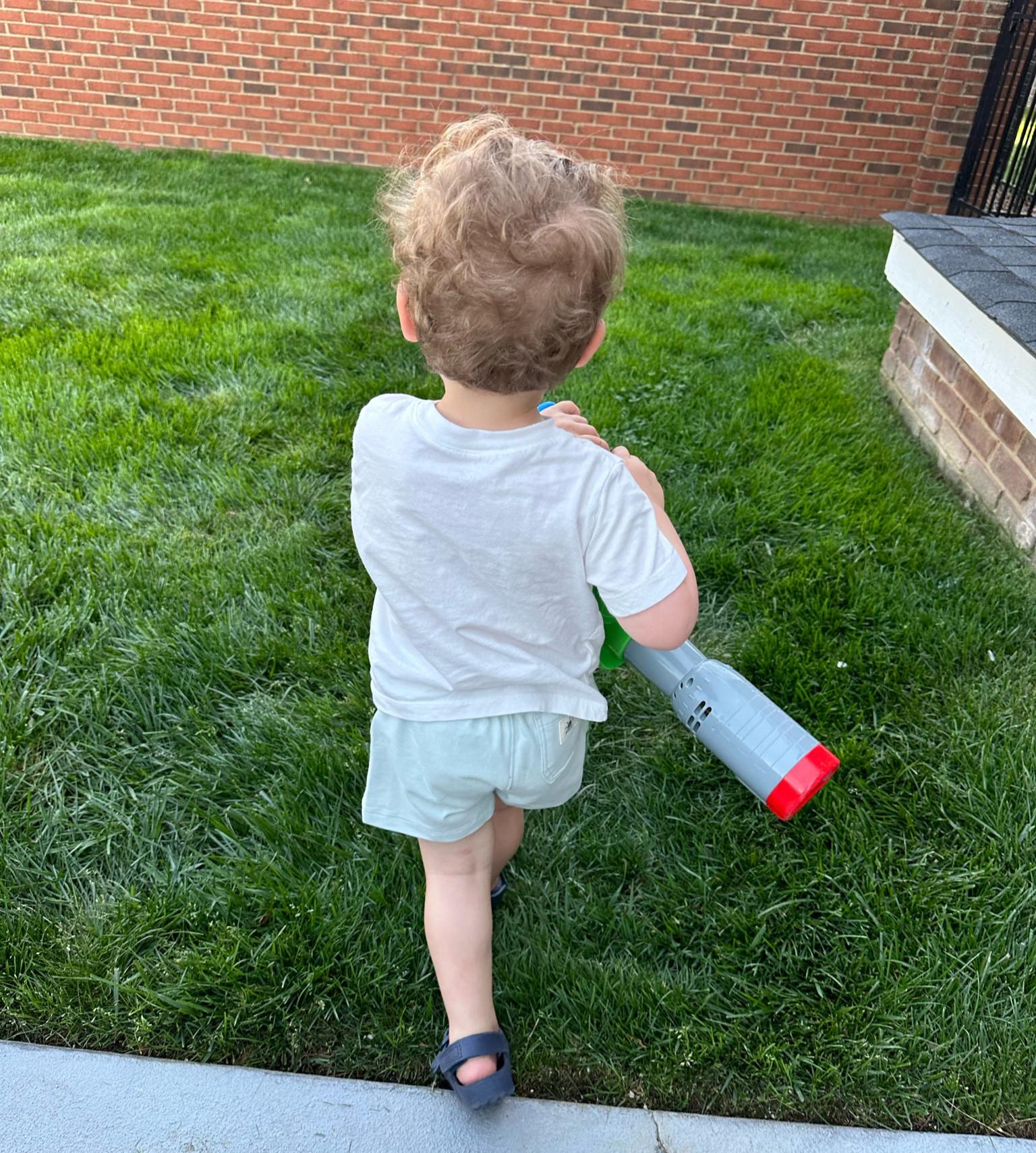Found more toddler boy shorts that aren’t super long! We actually also roll this pair over once! They run big, HRB is 22m and in the 18m shorts and 2T shirt. 

Anddd that little tag on the booty comes off super easily w a seam ripper! lol 

These little white tees are sooooo super soft too! 

HRB is obsessed w bubbles and this little leaf blower machine is adorable! The sandals are washable and a must— they run big!

#LTKbaby #LTKkids