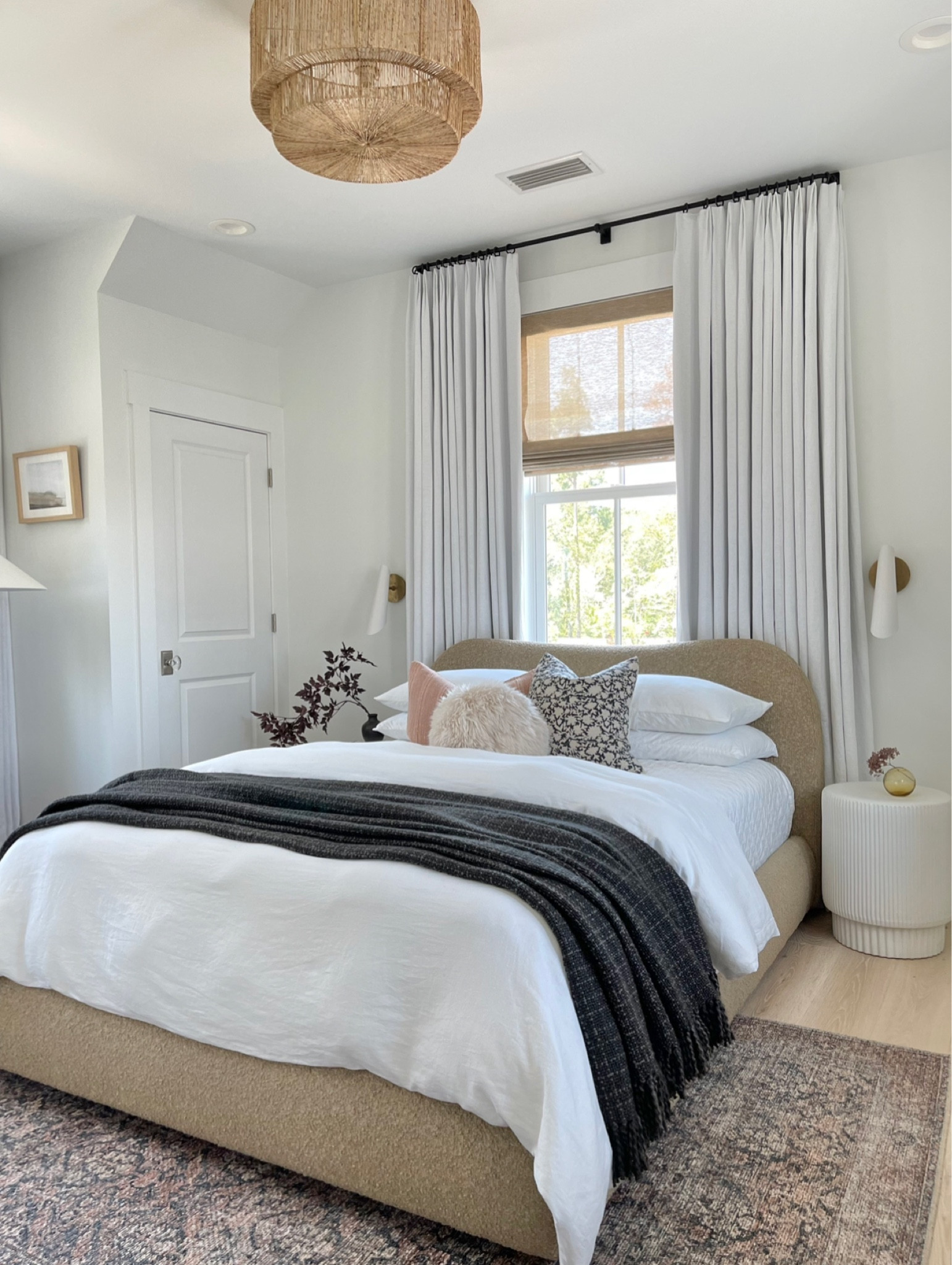Guest bedroom.  Two pages curtains.  White linen curtains.  Bedroom.  White bedding.  Black throw blanket.  Bedroom decor. Loloi rug.  Bedroom rug.  Bed pillows. Home decor.  White sconces.  Loloi Billie x Amber Lewis rug 

#LTKhome #LTKunder100