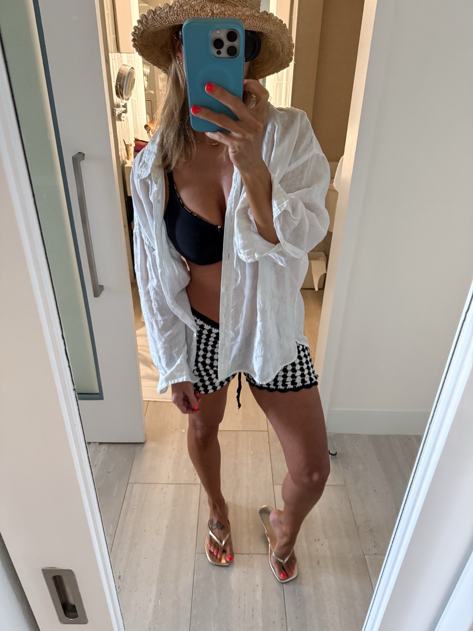 Vacation beach outfit - wearing xl in gap linen button down. I’ve had it for years now and still like brand new. Love this swimwear brand for fuller chested girls! TTS in tops and bottoms. Linked same hat and sandals. Shorts are old anthropology - linked similar! #vacationoutfit #linen #crochetshorts #beachoutfit

#LTKSaleAlert #LTKSwim