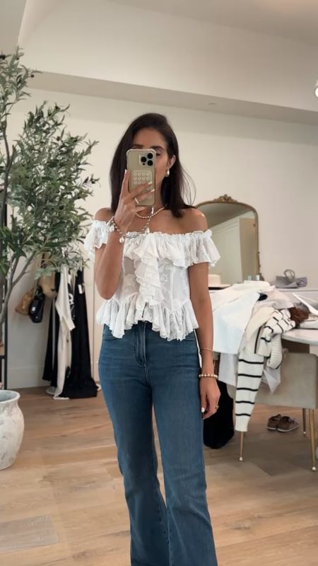 I almost didn't buy this top but I'm so glad I did! It is so darling and can be dressed up for going out or style it with your favorite denim. I'm just shy of 5-7" wearing the size XS #StylinByAylin #Aylin

#LTKSeasonal #LTKVideo #LTKStyleTip