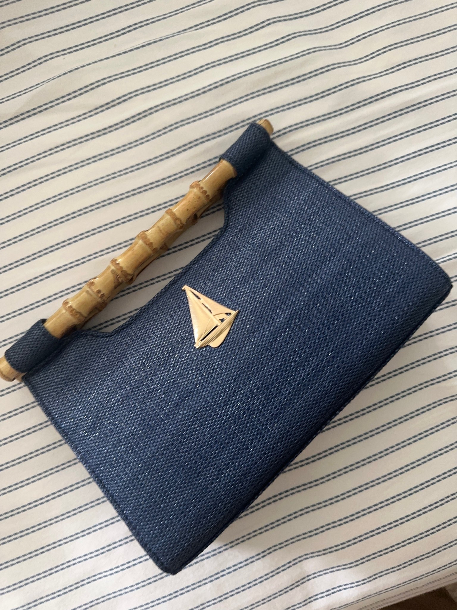 The most darling nautical navy straw clutch I ever did see 💙

#LTKOver40 #LTKSeasonal