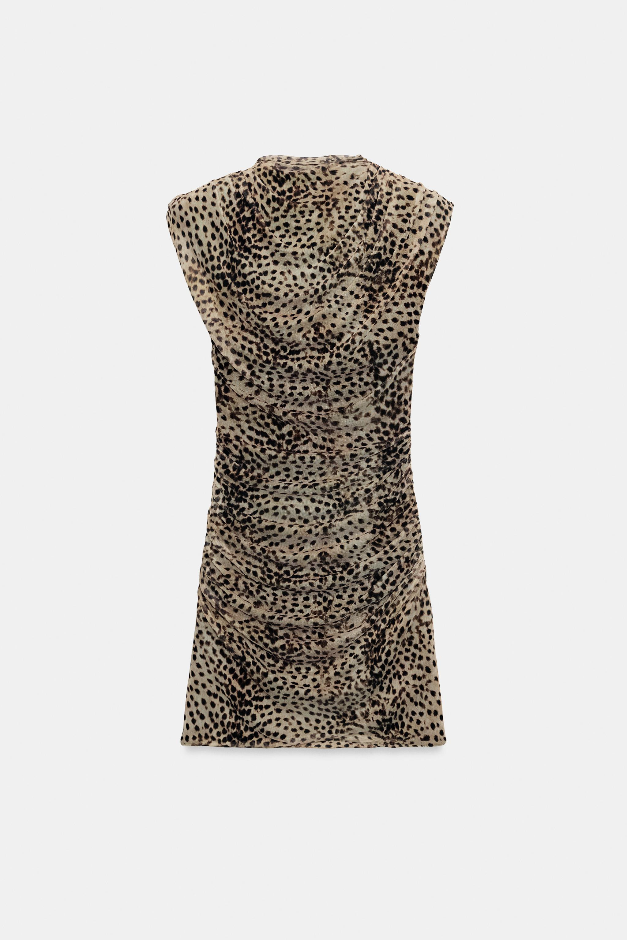 Sleeveless mini dress featuring a straight neckline and shoulder pads. Draped fabric detail. Feat... | Zara US
